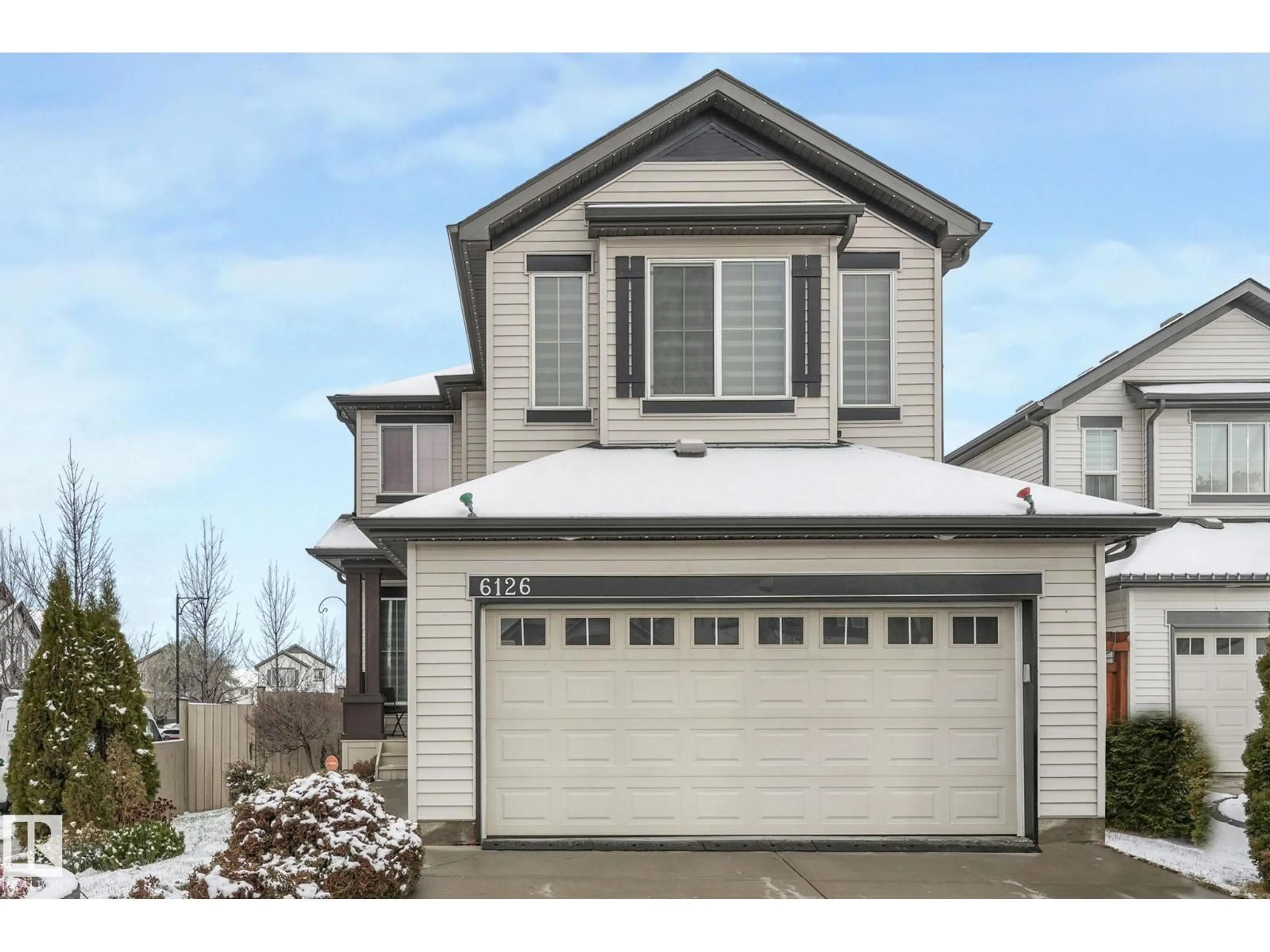 Home with vinyl exterior material, street for 6126 17A AV, Edmonton Alberta T6X0W2