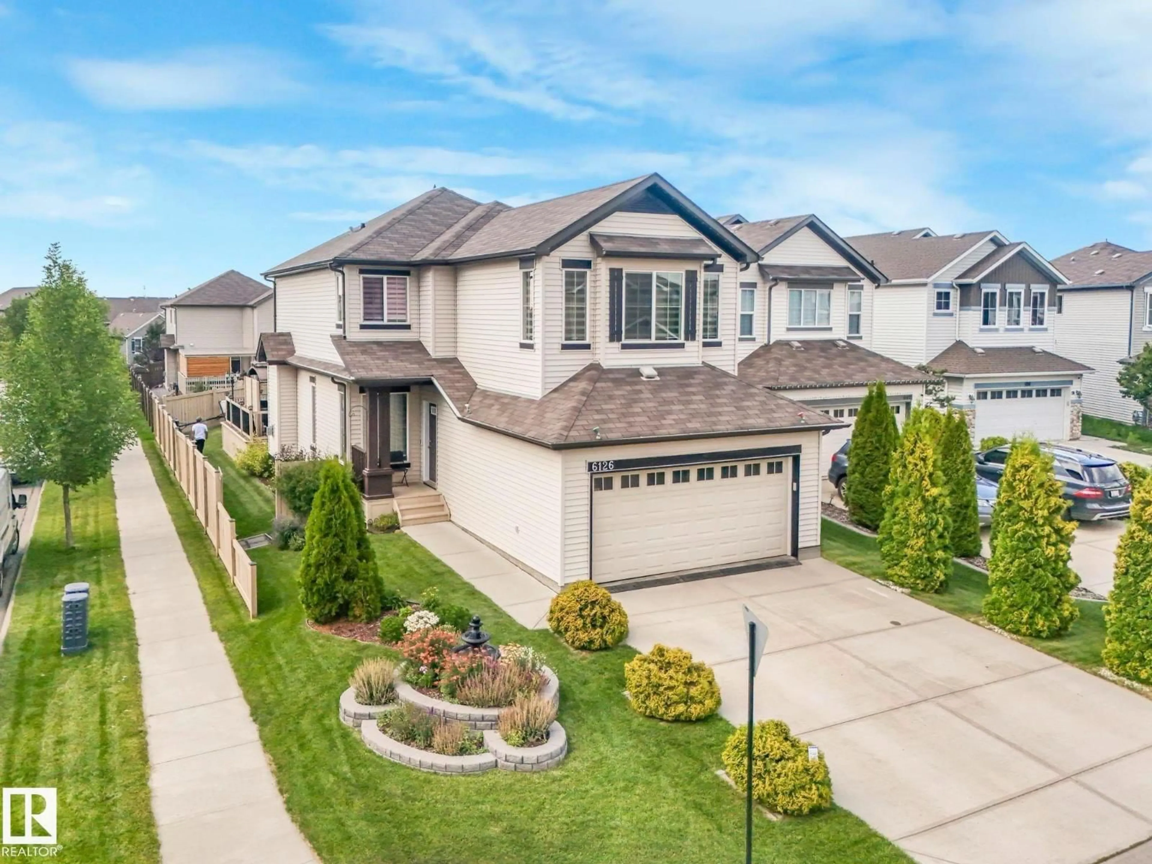 A pic from outside/outdoor area/front of a property/back of a property/a pic from drone, street for 6126 17A AV, Edmonton Alberta T6X0W2