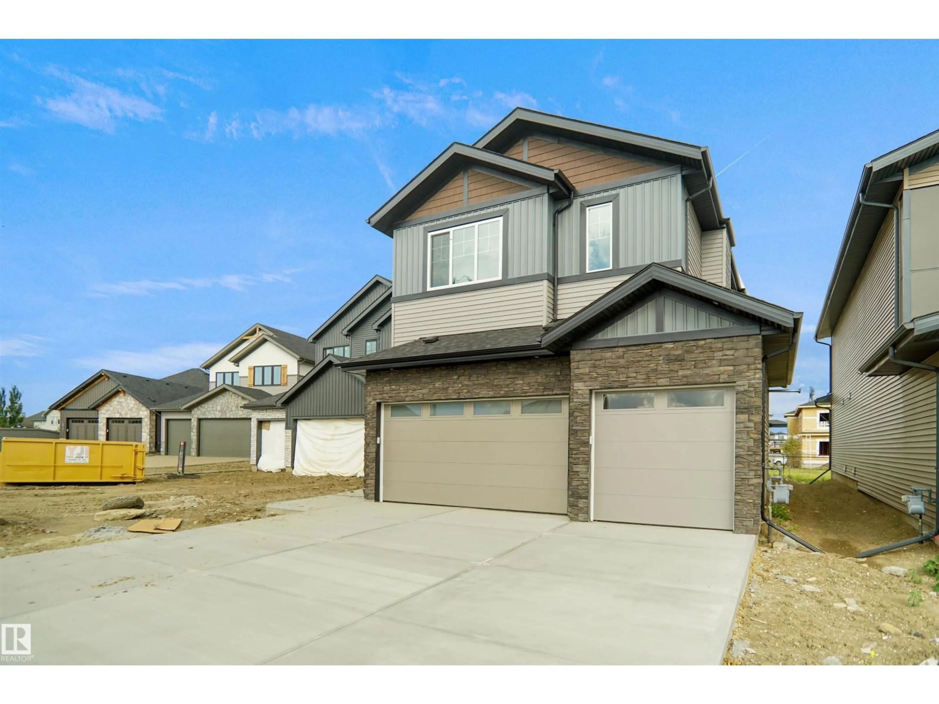 Home with vinyl exterior material, street for 4007 - 4007 41 ST, Beaumont Alberta T4X3C1