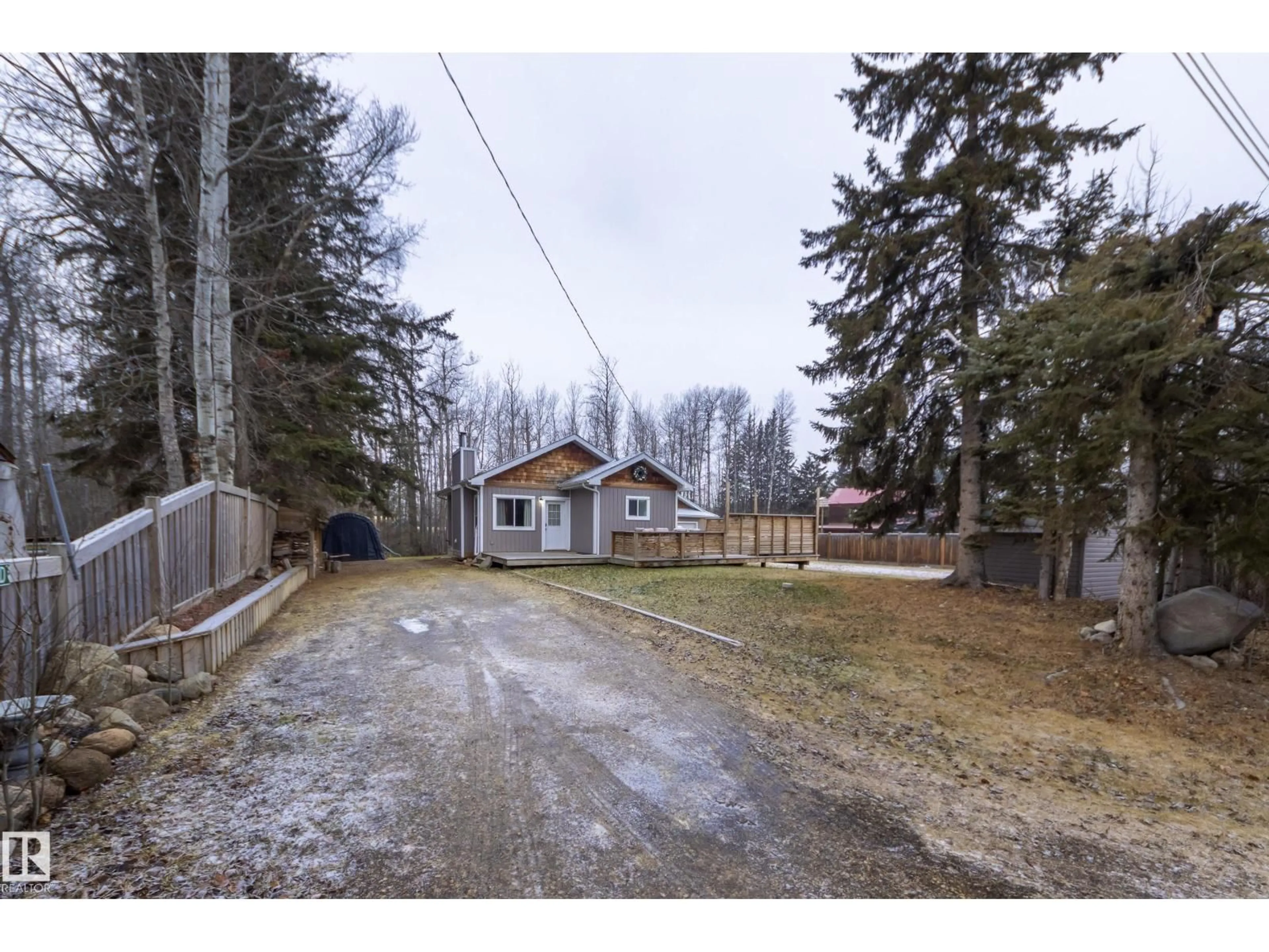 A pic from outside/outdoor area/front of a property/back of a property/a pic from drone, street for 304 & 306 - 53414 RANGE ROAD 62, Rural Lac Ste. Anne County Alberta T7E3M1