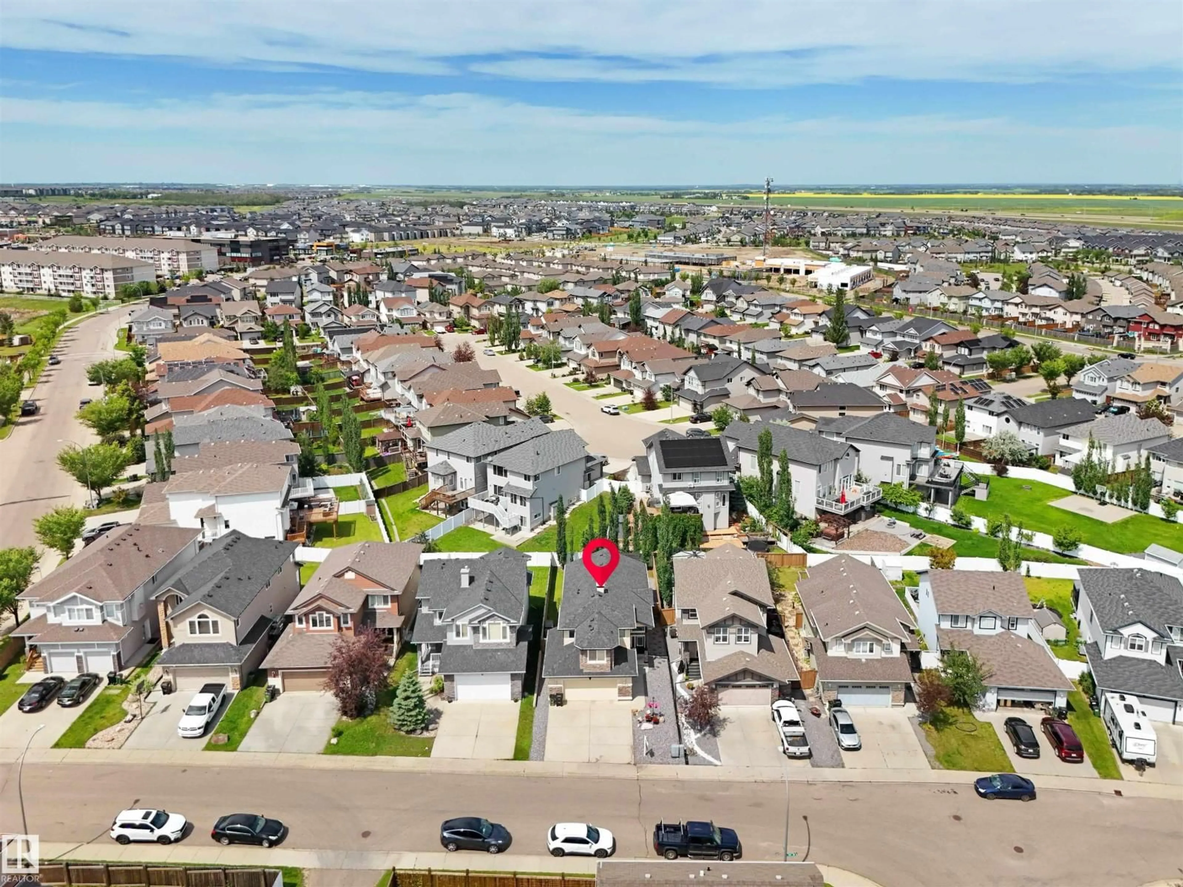 A pic from outside/outdoor area/front of a property/back of a property/a pic from drone, street for 3812 163 AV, Edmonton Alberta T5Y0G6