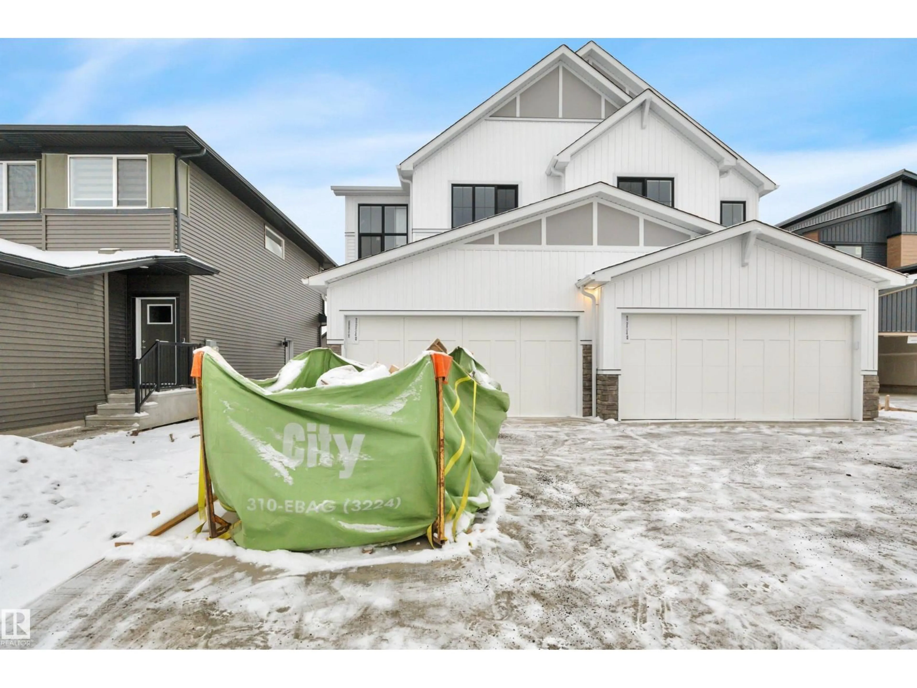 Home with vinyl exterior material, street for 8929 ELVES LO, Edmonton Alberta T6M3G3