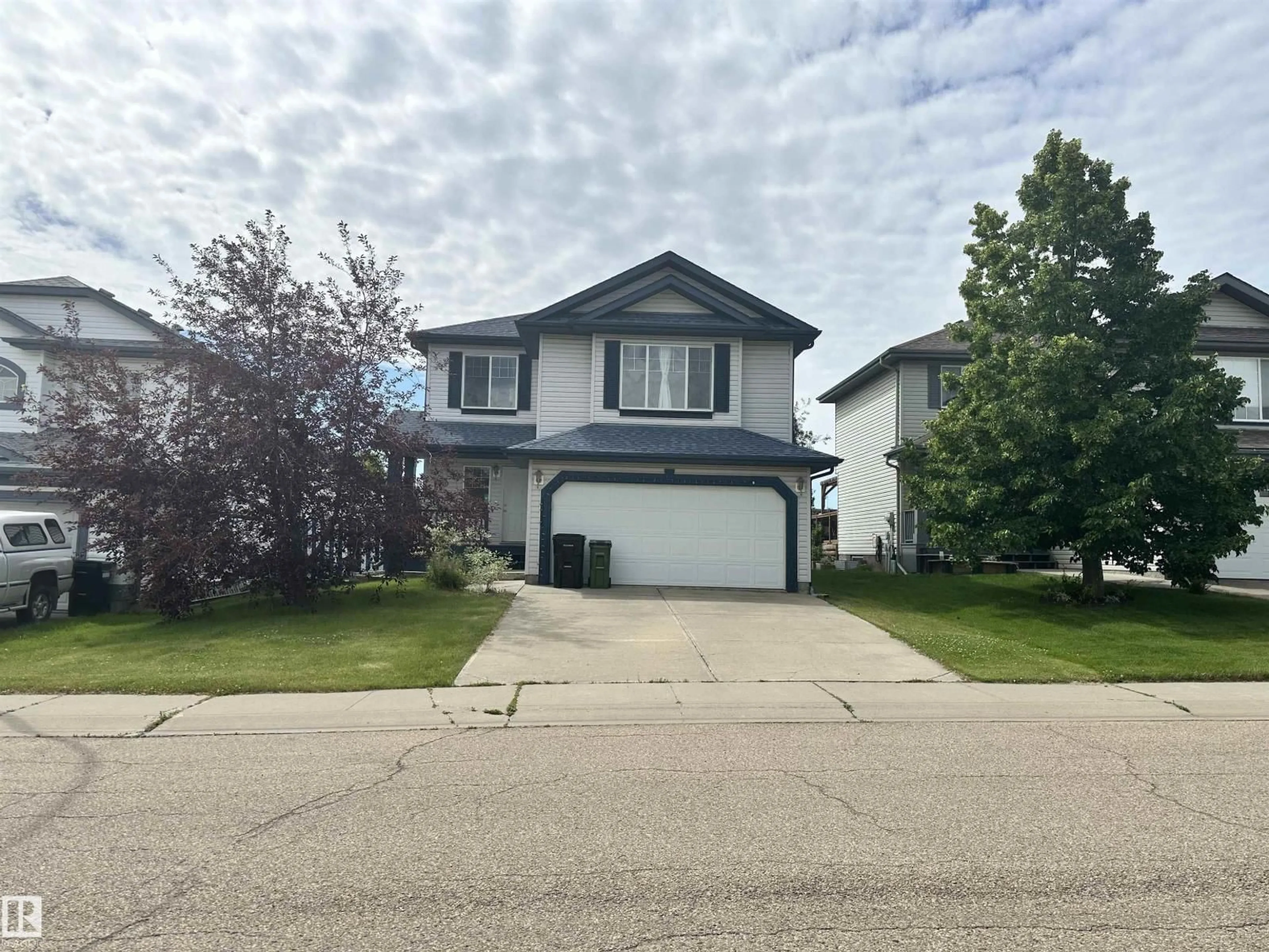 Home with vinyl exterior material, street for 4619 151 AV, Edmonton Alberta T5Y3A1