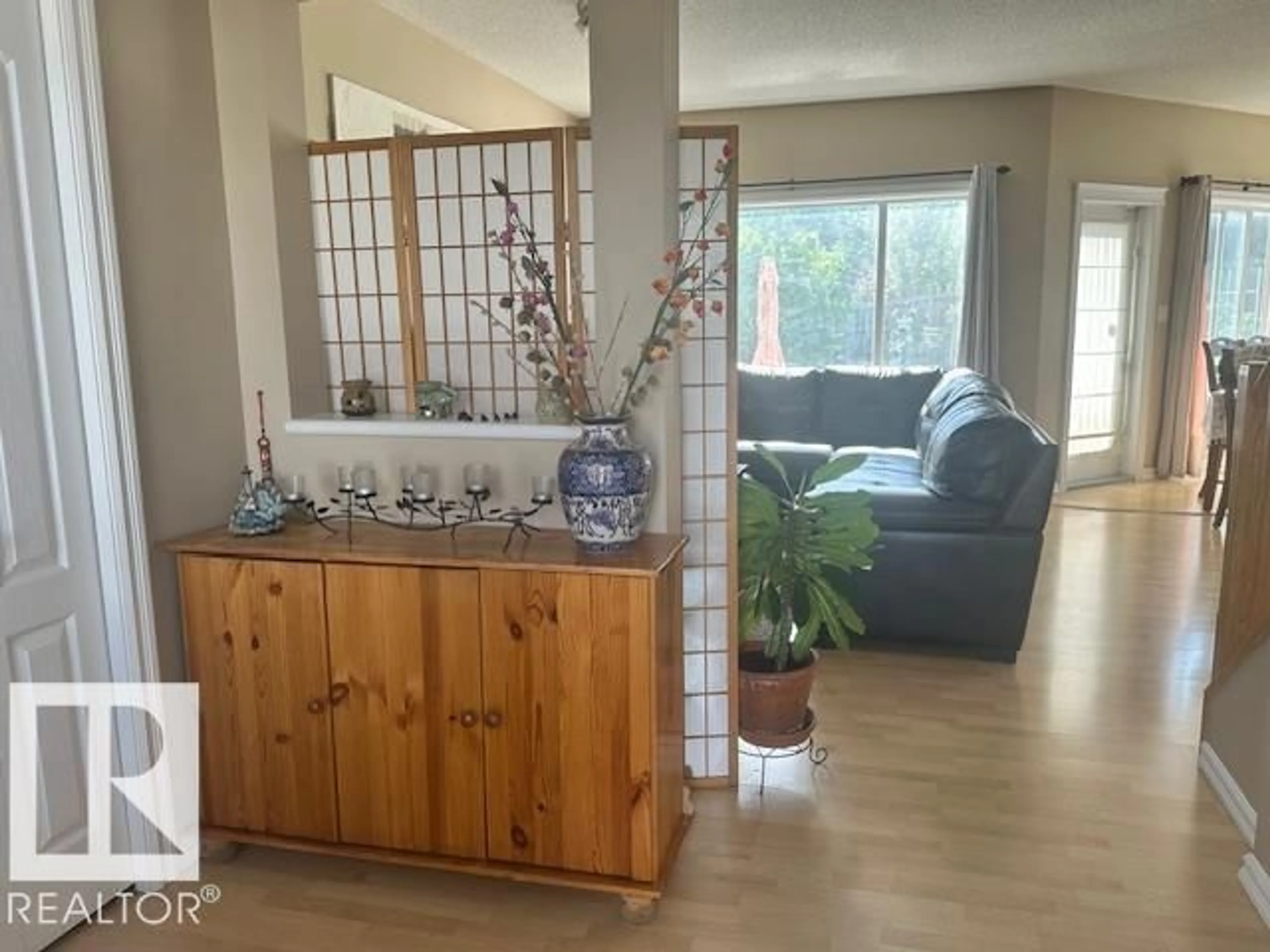 Living room with furniture, unknown for 4619 151 AV, Edmonton Alberta T5Y3A1