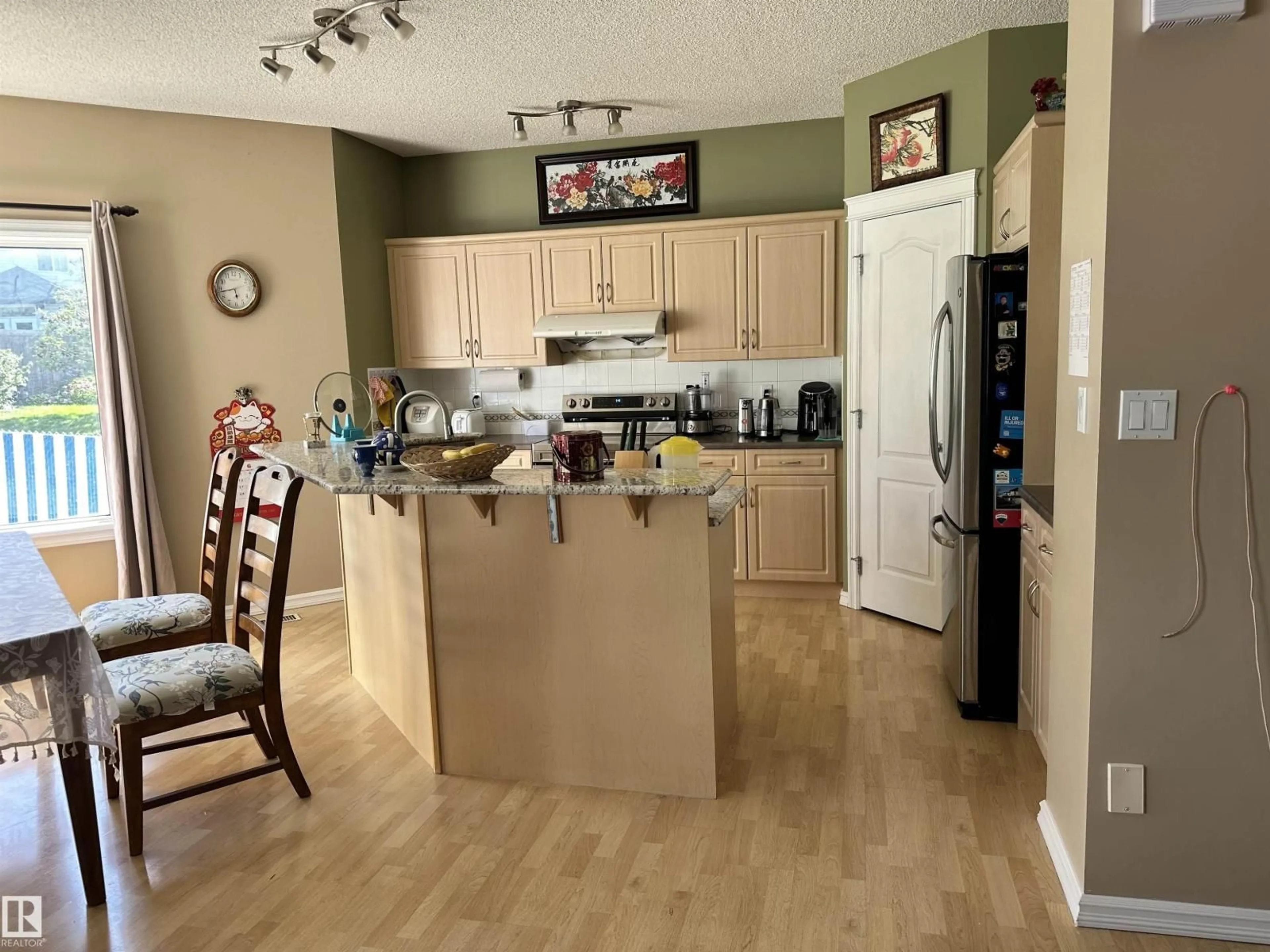 Open concept kitchen, unknown for 4619 151 AV, Edmonton Alberta T5Y3A1