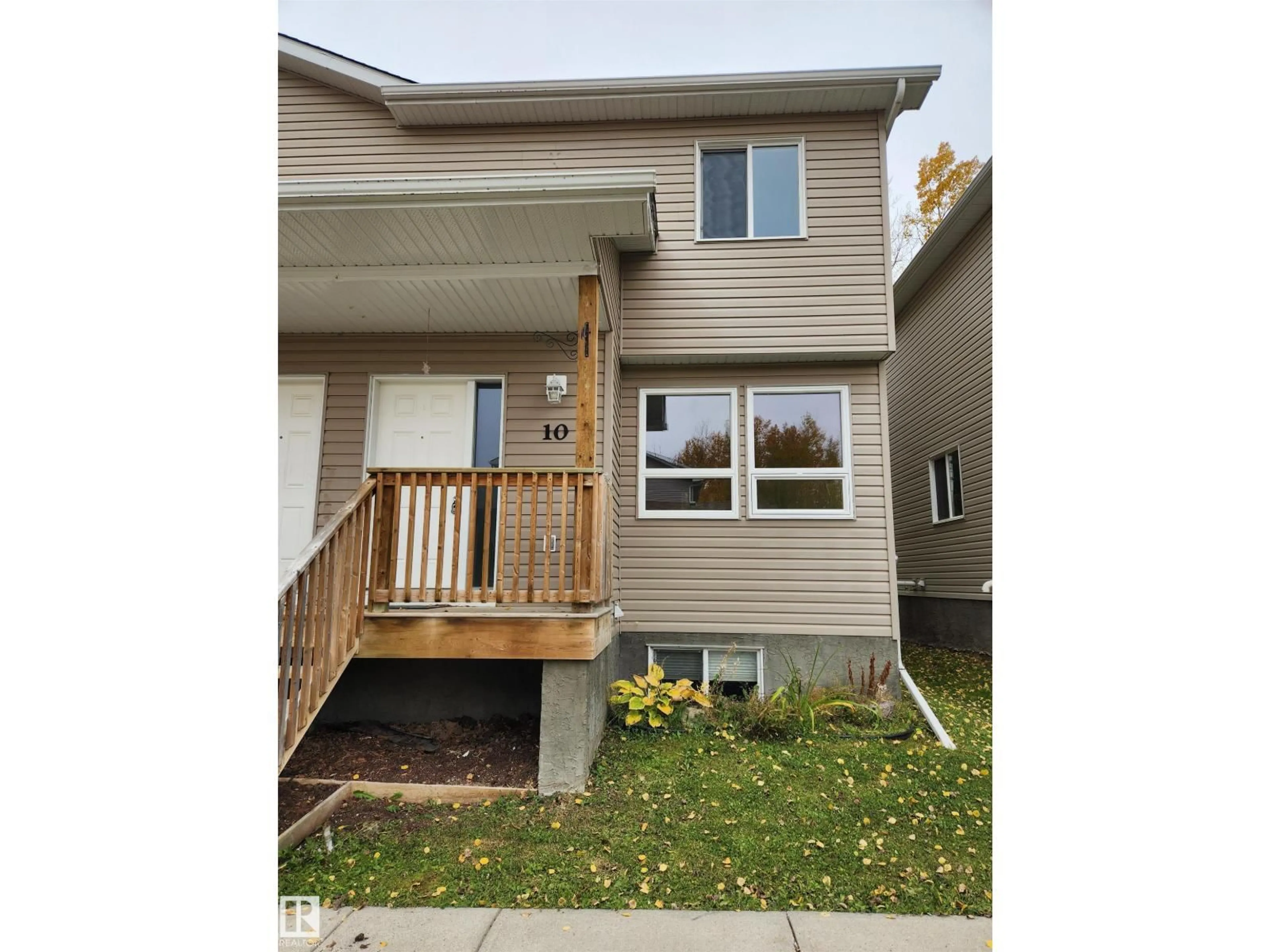 Home with vinyl exterior material, street for 10 624 41 ST, Edson Alberta T7E1A2