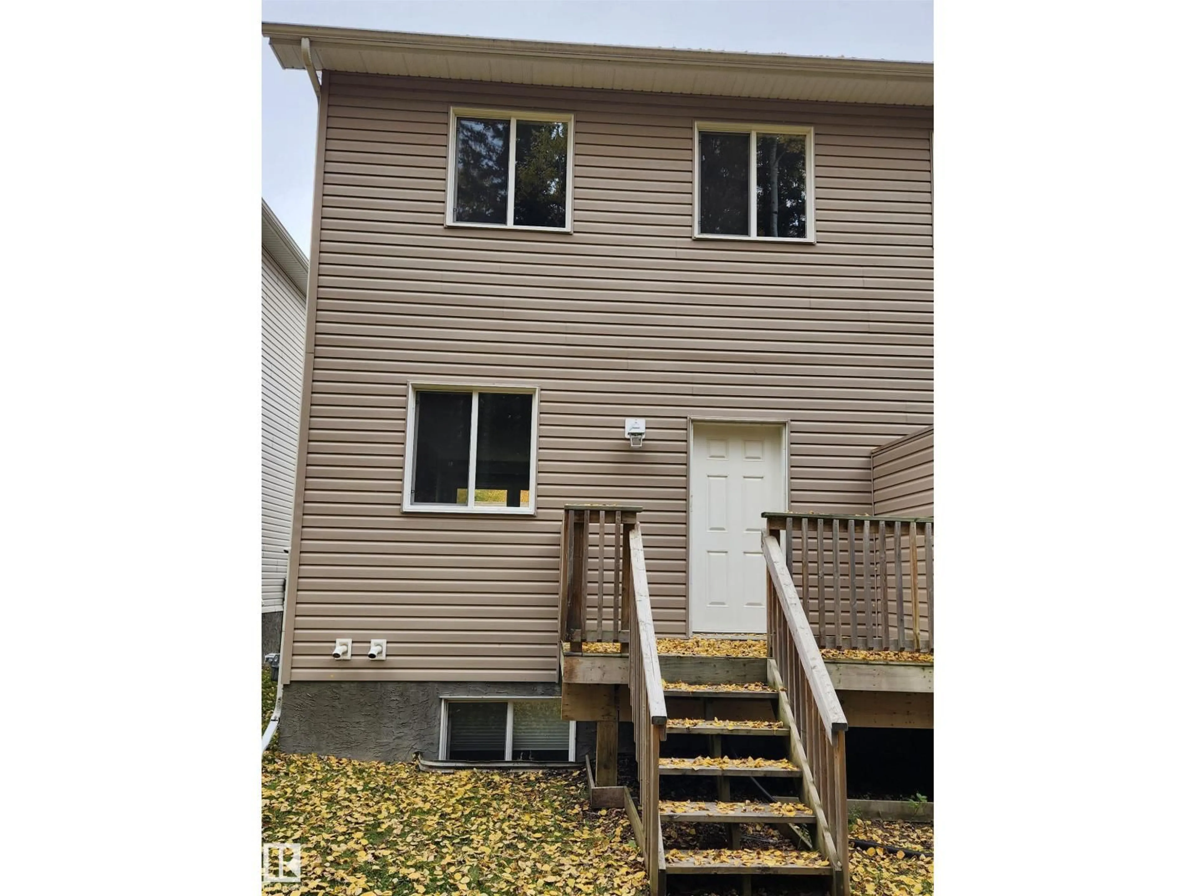 Home with vinyl exterior material, street for 10 624 41 ST, Edson Alberta T7E1A2