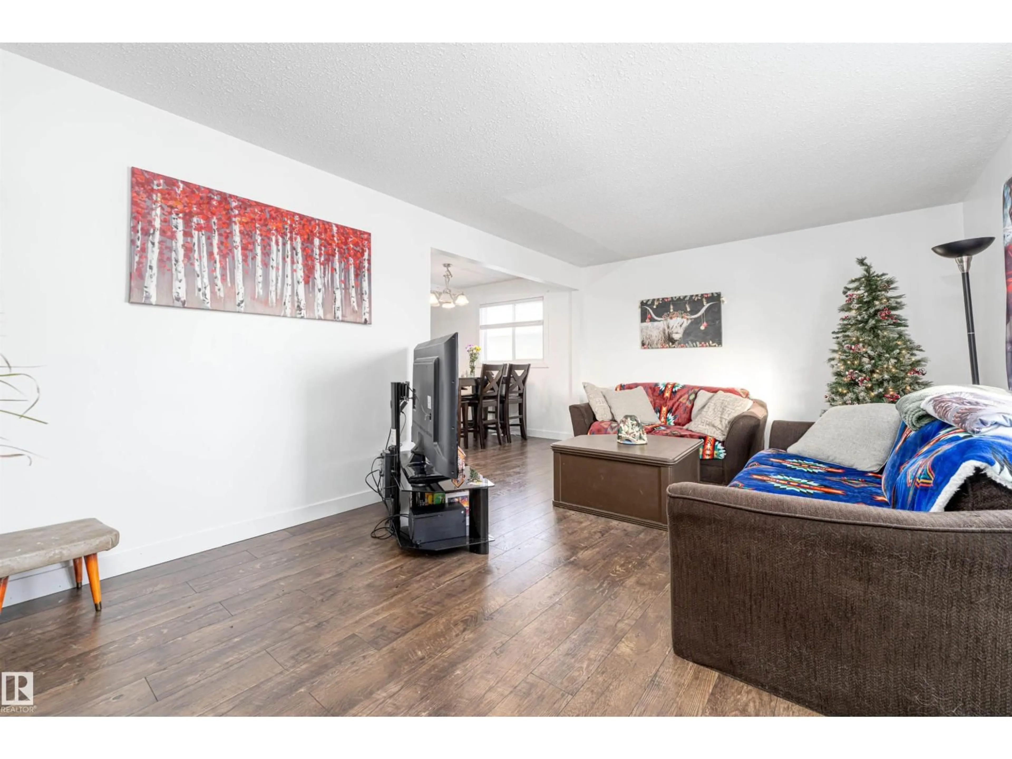 Living room with furniture, wood/laminate floor for 5116 59 ST, Redwater Alberta T0A2W0