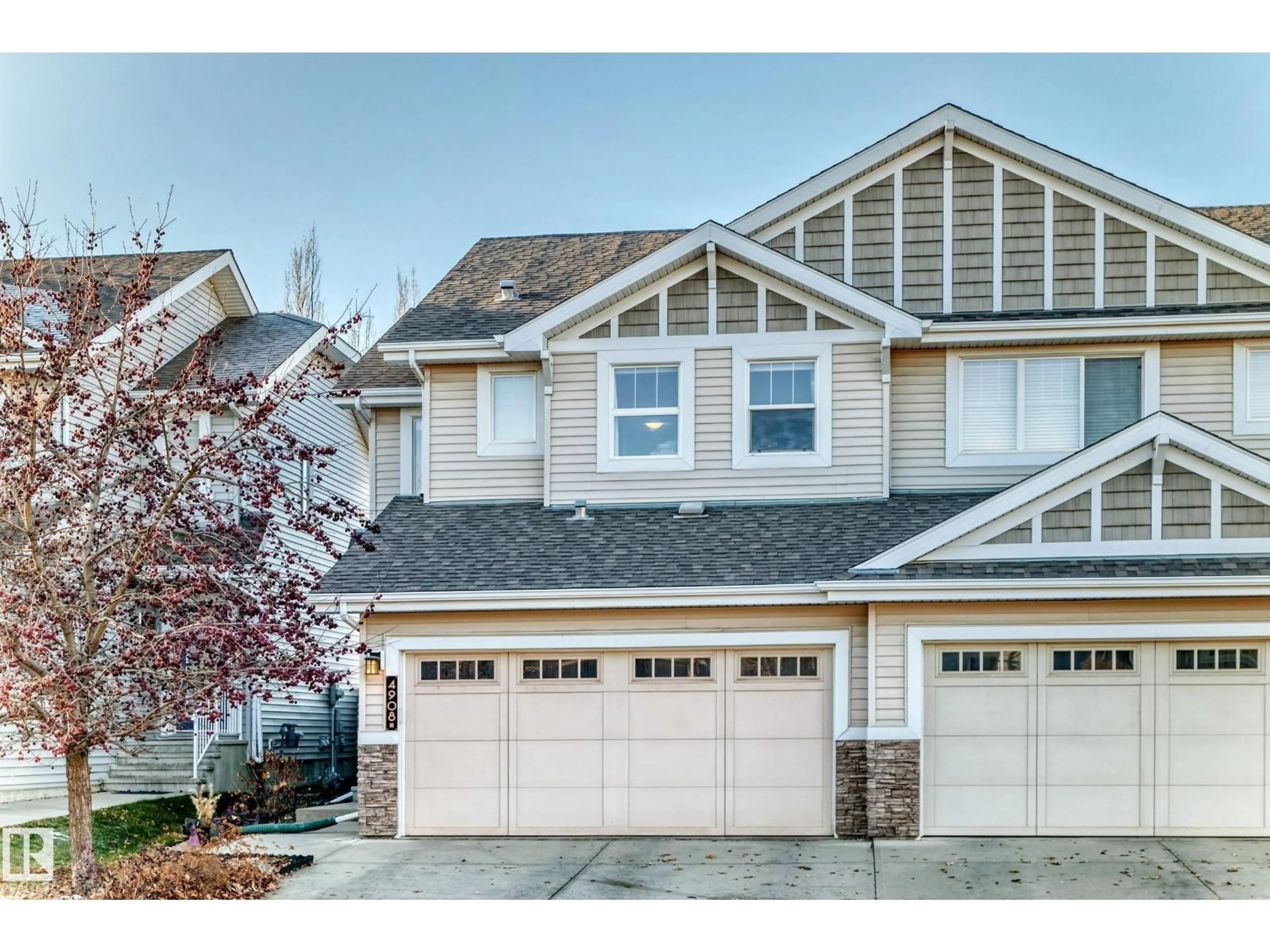 Home with vinyl exterior material, street for 4908 213 ST, Edmonton Alberta T6M0G6