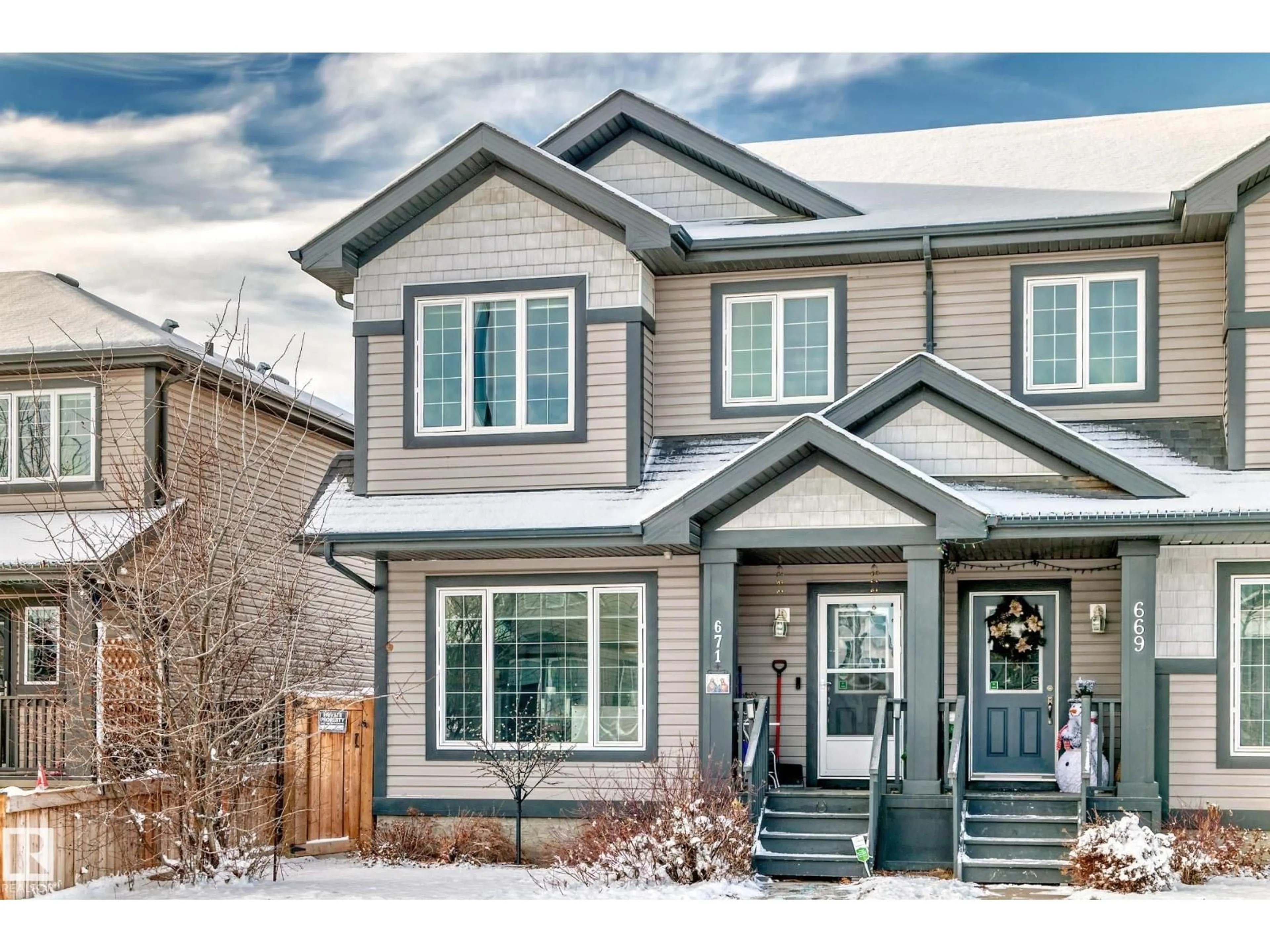 Home with vinyl exterior material, street for 671 LEWIS GREEN DR, Edmonton Alberta T5T4V9