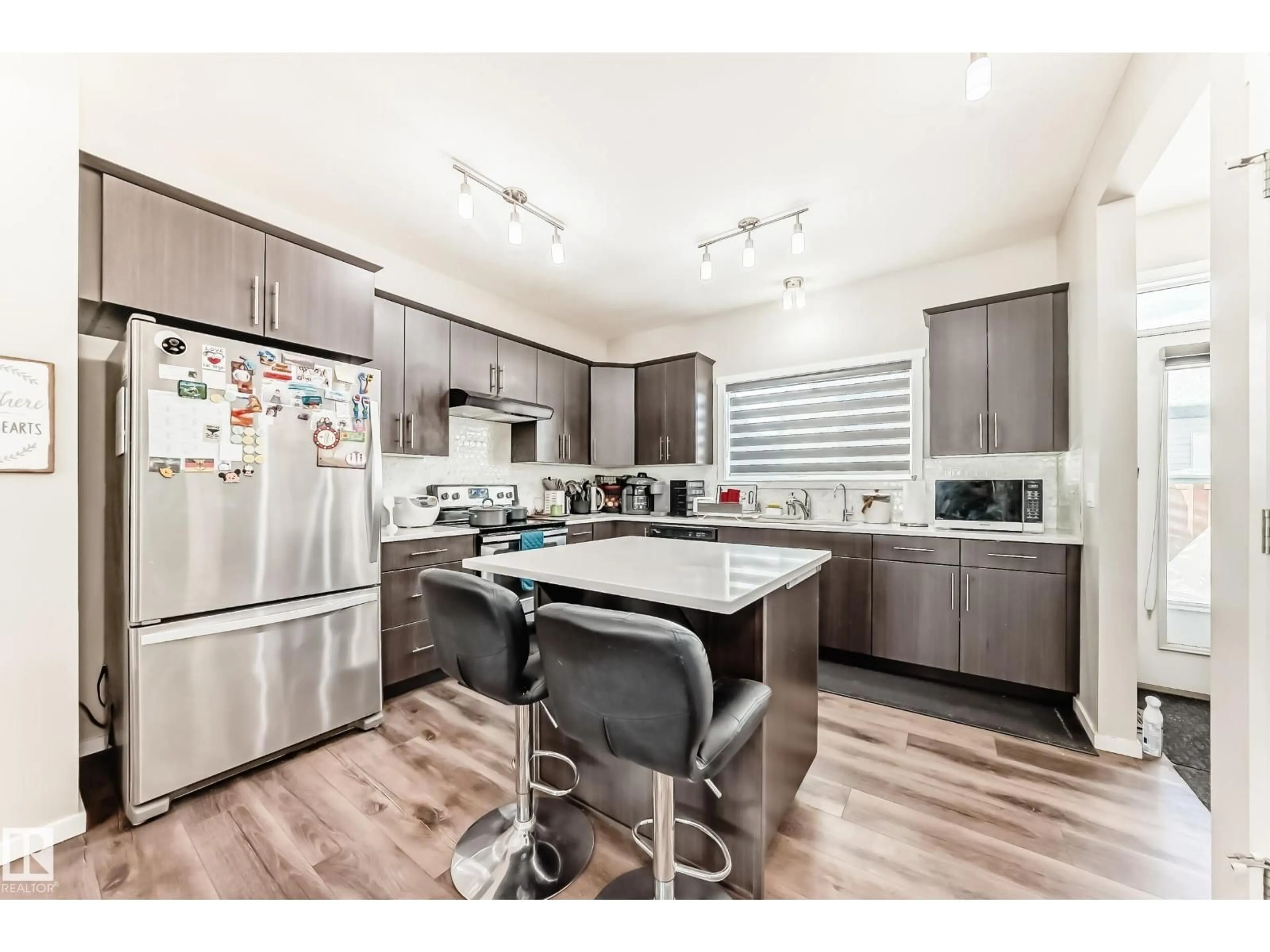 Open concept kitchen, unknown for 671 LEWIS GREEN DR, Edmonton Alberta T5T4V9