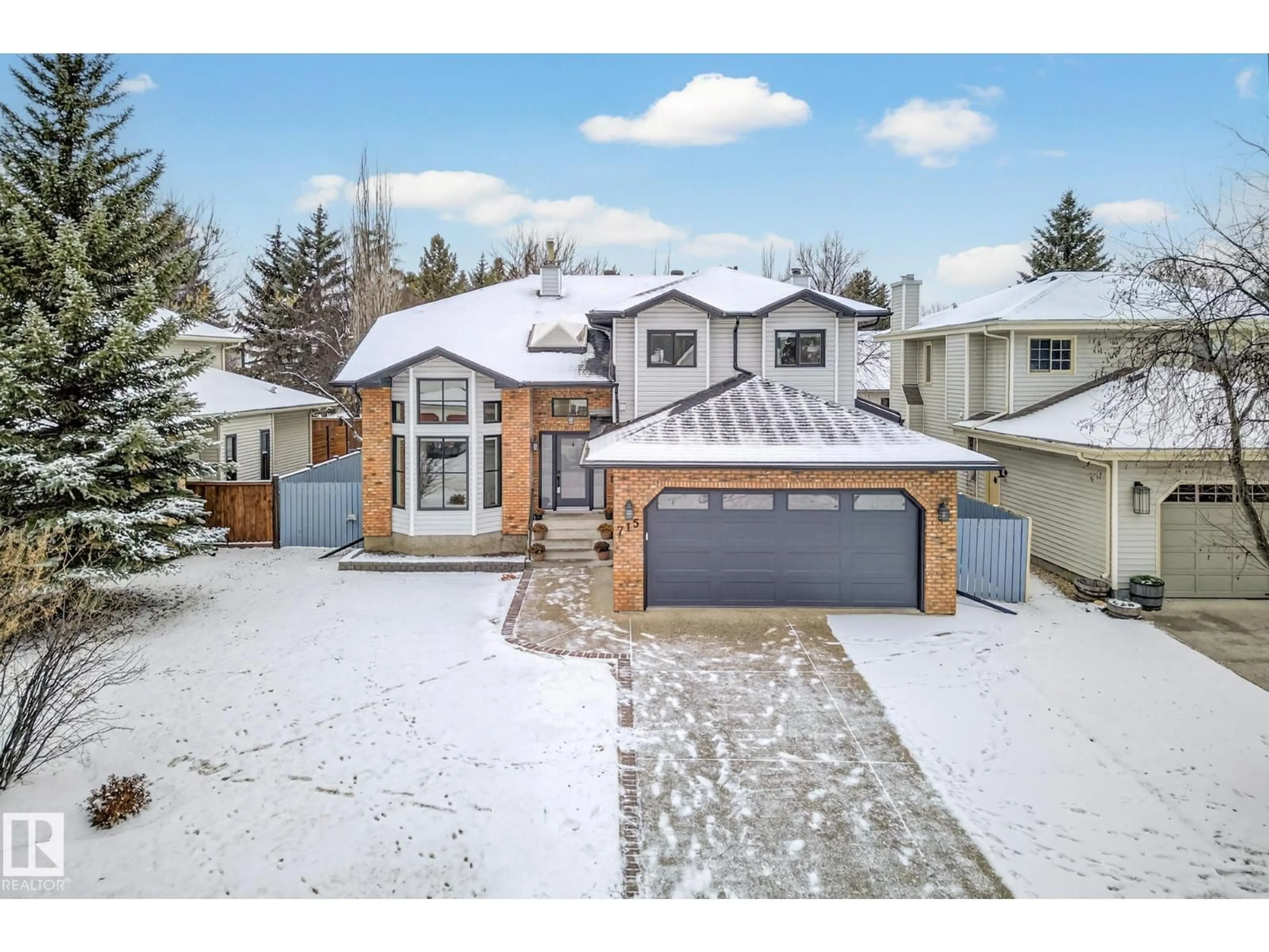 A pic from outside/outdoor area/front of a property/back of a property/a pic from drone, street for 715 BURLEY DR, Edmonton Alberta T6R1W7