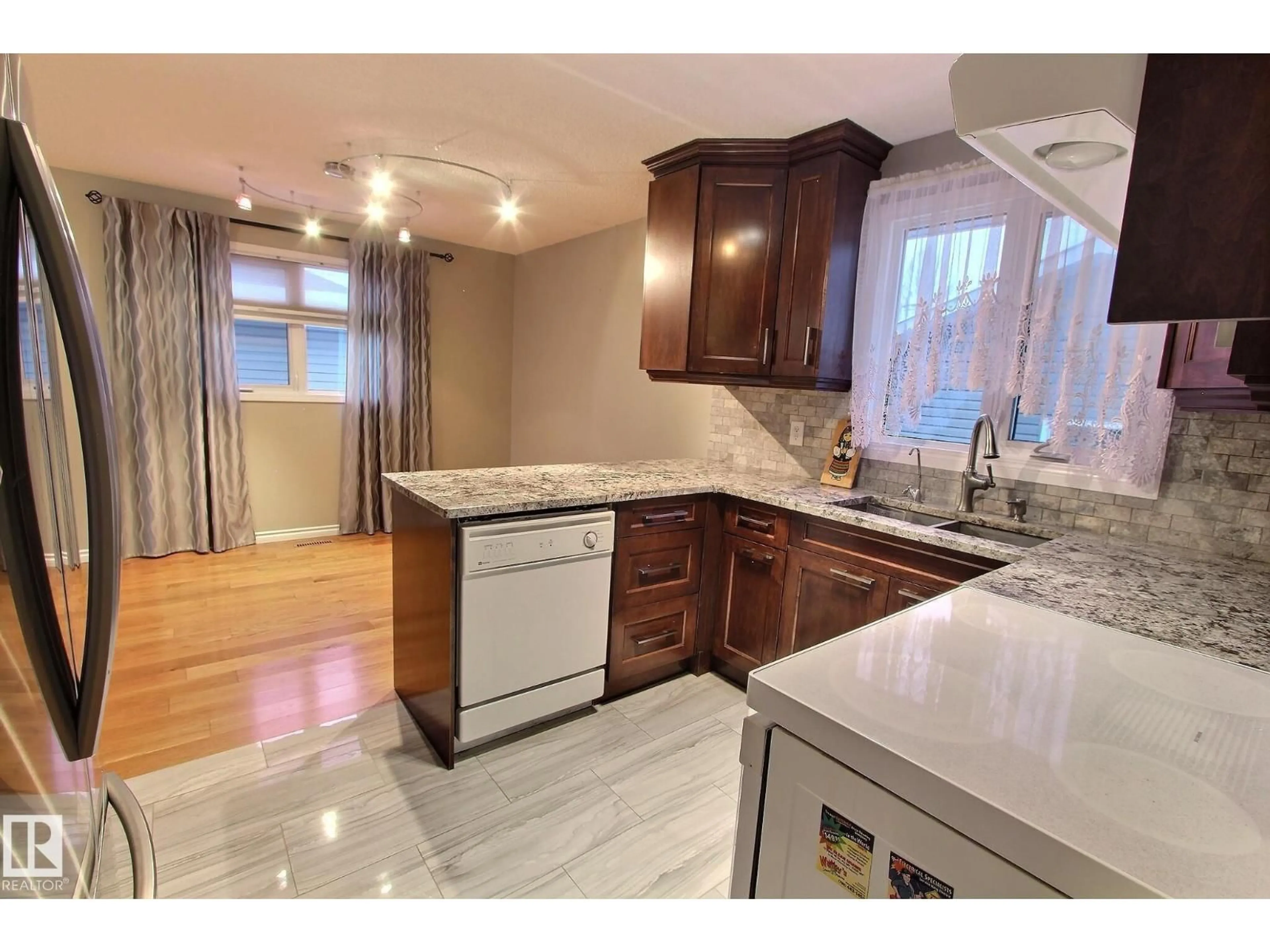 Open concept kitchen, unknown for 14608 29A ST NW, Edmonton Alberta T5Y2A2