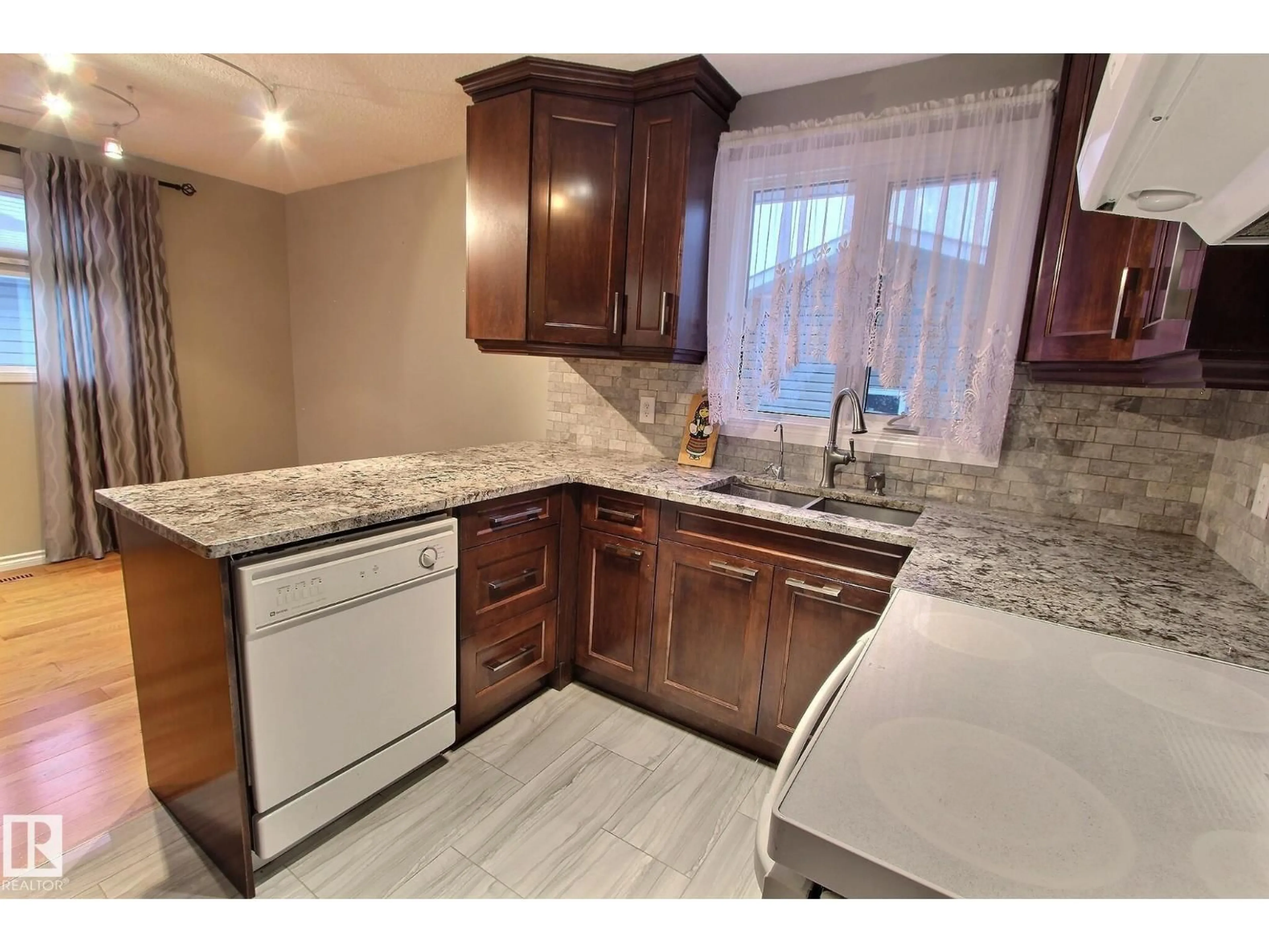 Standard kitchen, ceramic/tile floor for 14608 29A ST NW, Edmonton Alberta T5Y2A2