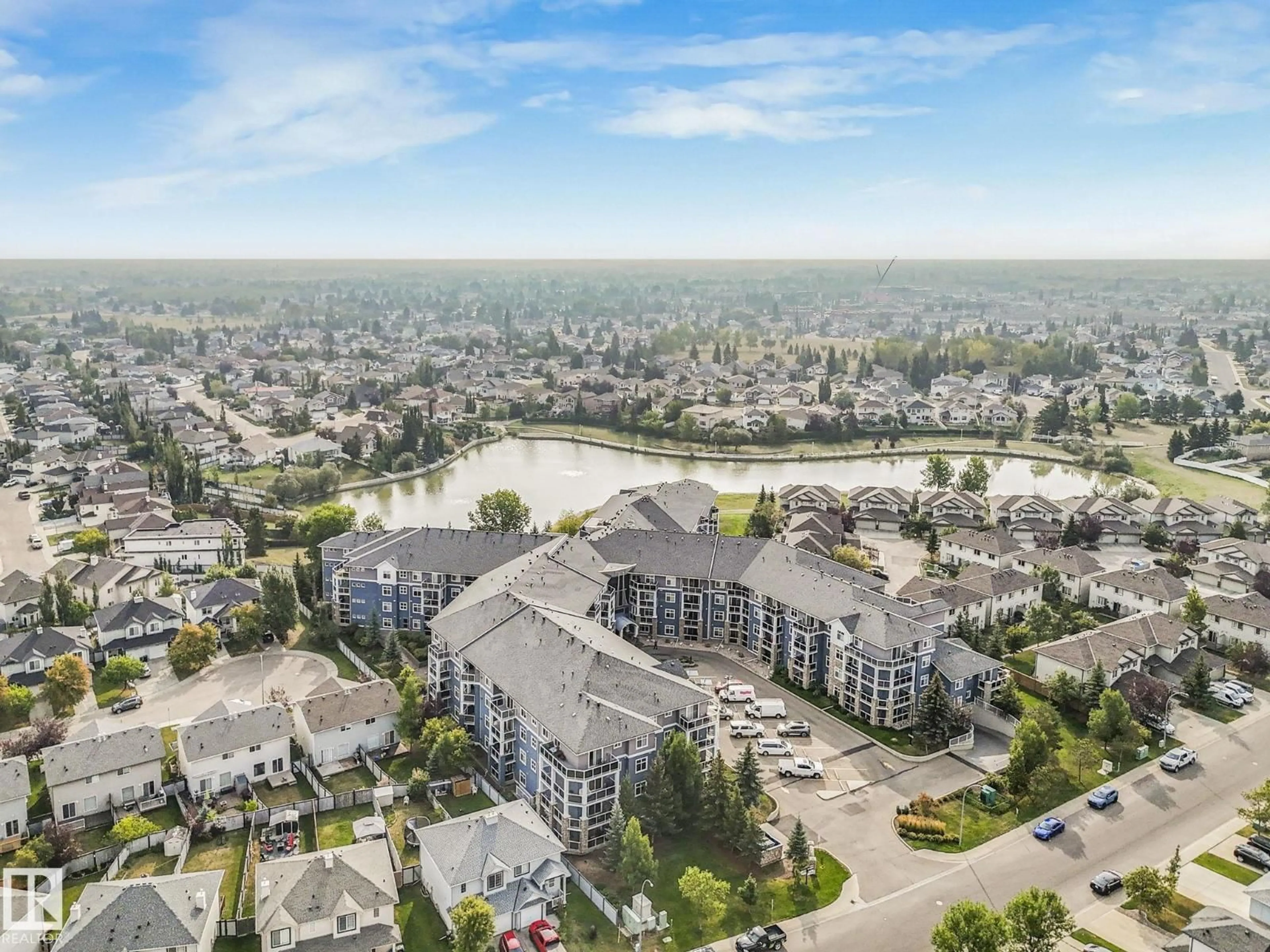 A pic from outside/outdoor area/front of a property/back of a property/a pic from drone, water/lake/river/ocean view for 332 16035 132 ST NW, Edmonton Alberta T6V0B4