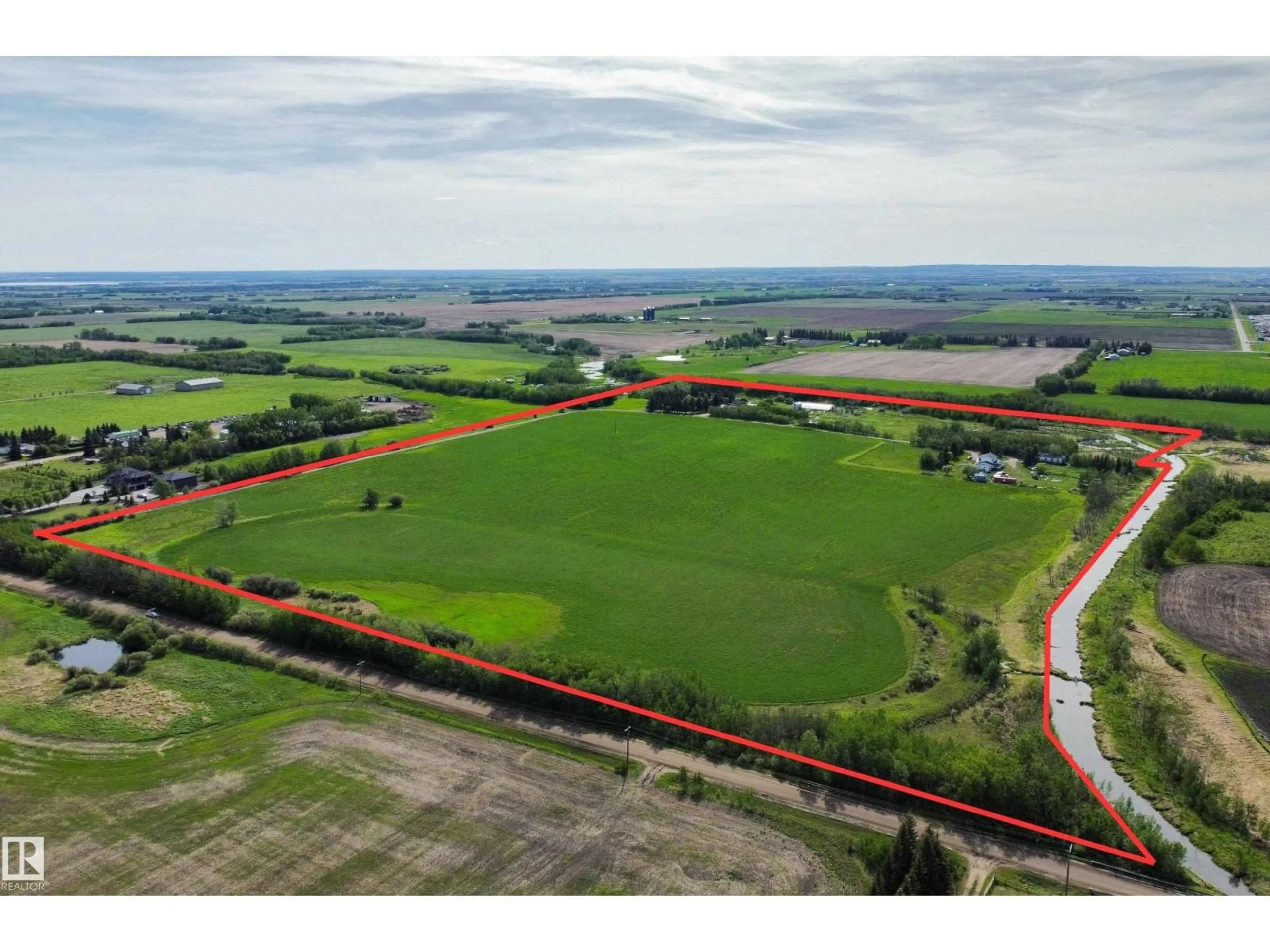 A pic from outside/outdoor area/front of a property/back of a property/a pic from drone, water/lake/river/ocean view for 54318 RGE RD 255, St. Albert Alberta T8T0T8