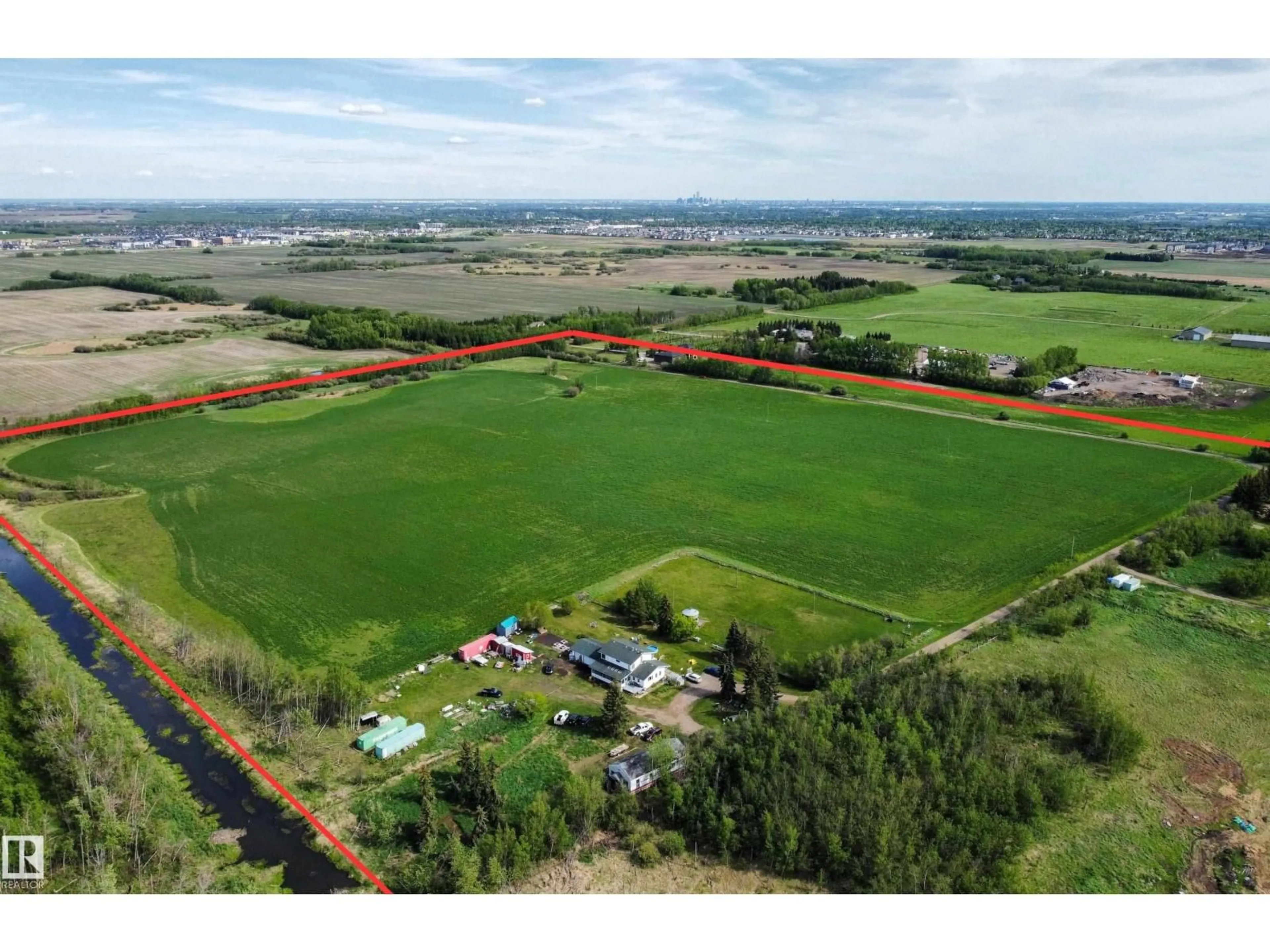 A pic from outside/outdoor area/front of a property/back of a property/a pic from drone, unknown for 54318 RGE RD 255, St. Albert Alberta T8T0T8