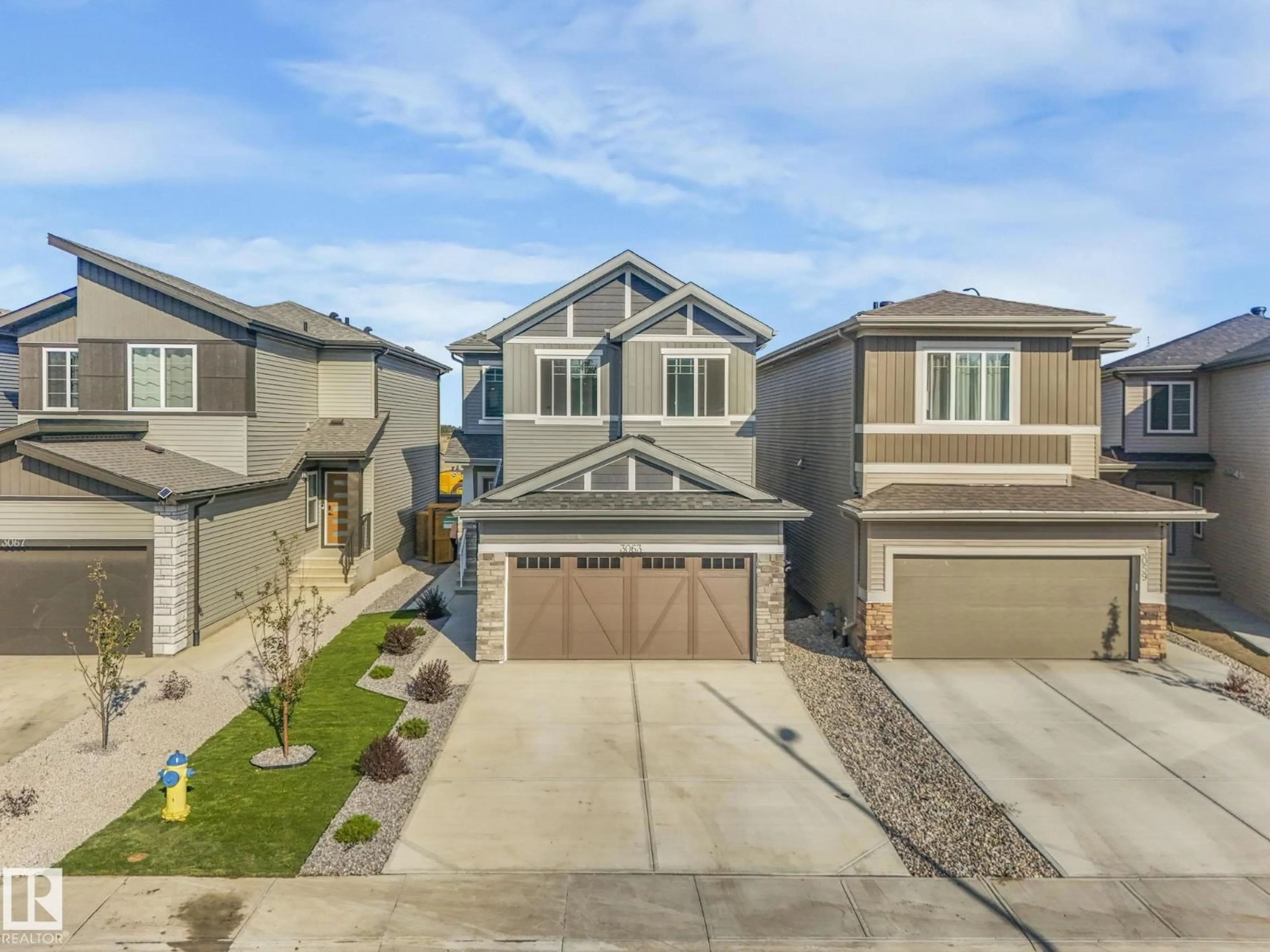 A pic from outside/outdoor area/front of a property/back of a property/a pic from drone, street for NW - 3063 200 ST, Edmonton Alberta T6M1N7