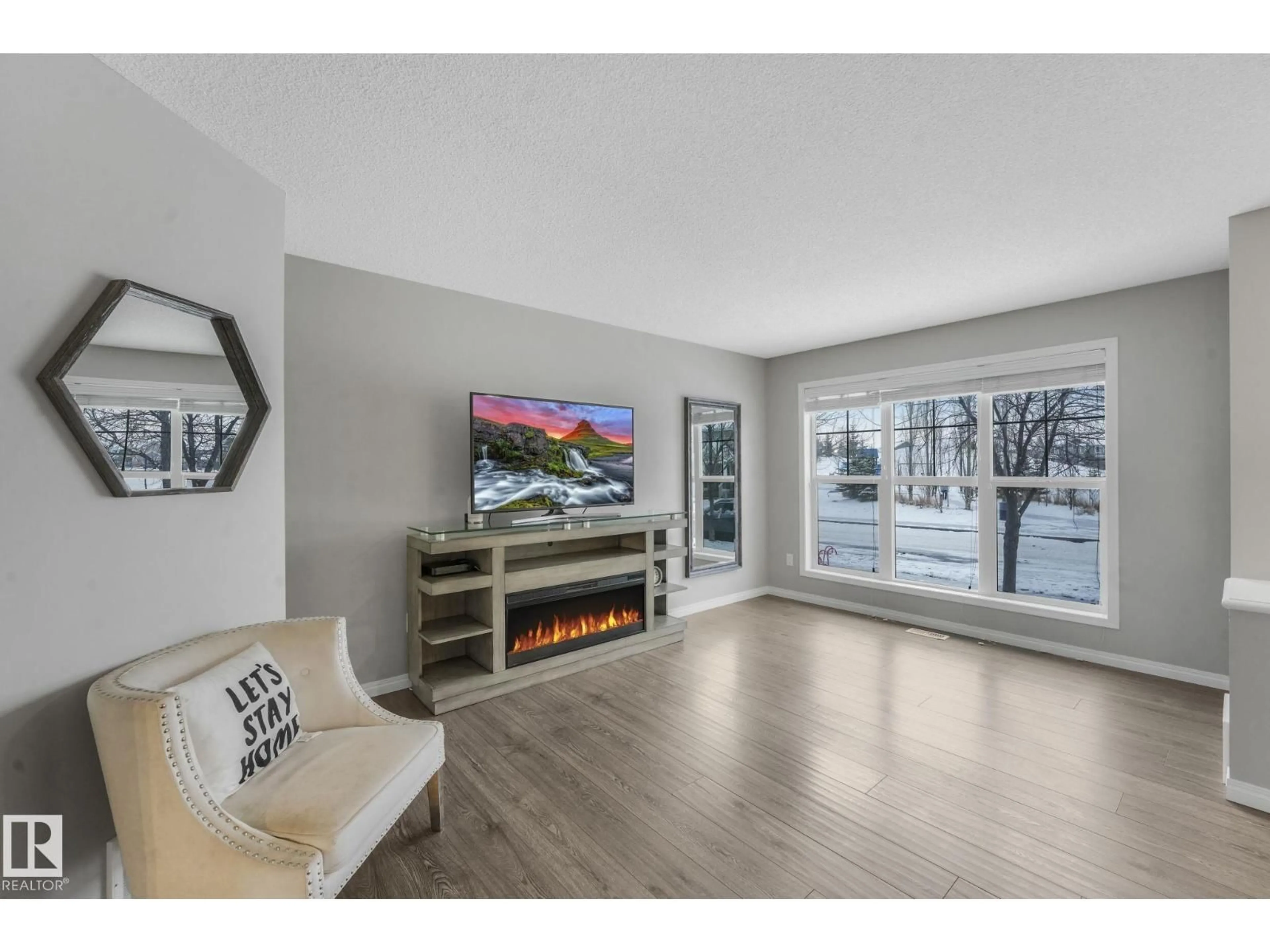 Living room with furniture, unknown for SW - 6862 21A AV, Edmonton Alberta T6X0S3