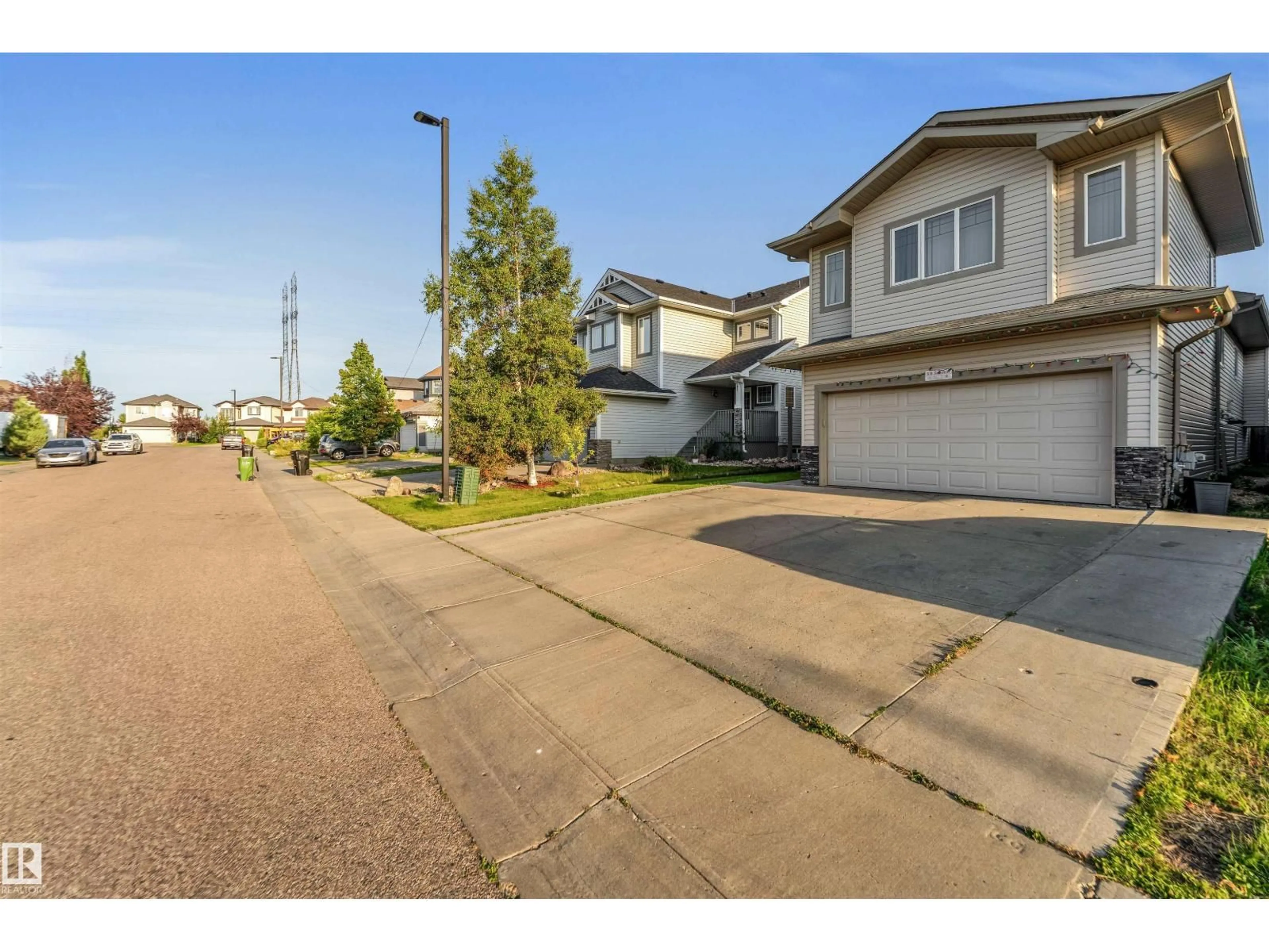 A pic from outside/outdoor area/front of a property/back of a property/a pic from drone, street for 3015 24 AV, Edmonton Alberta T6T0G7