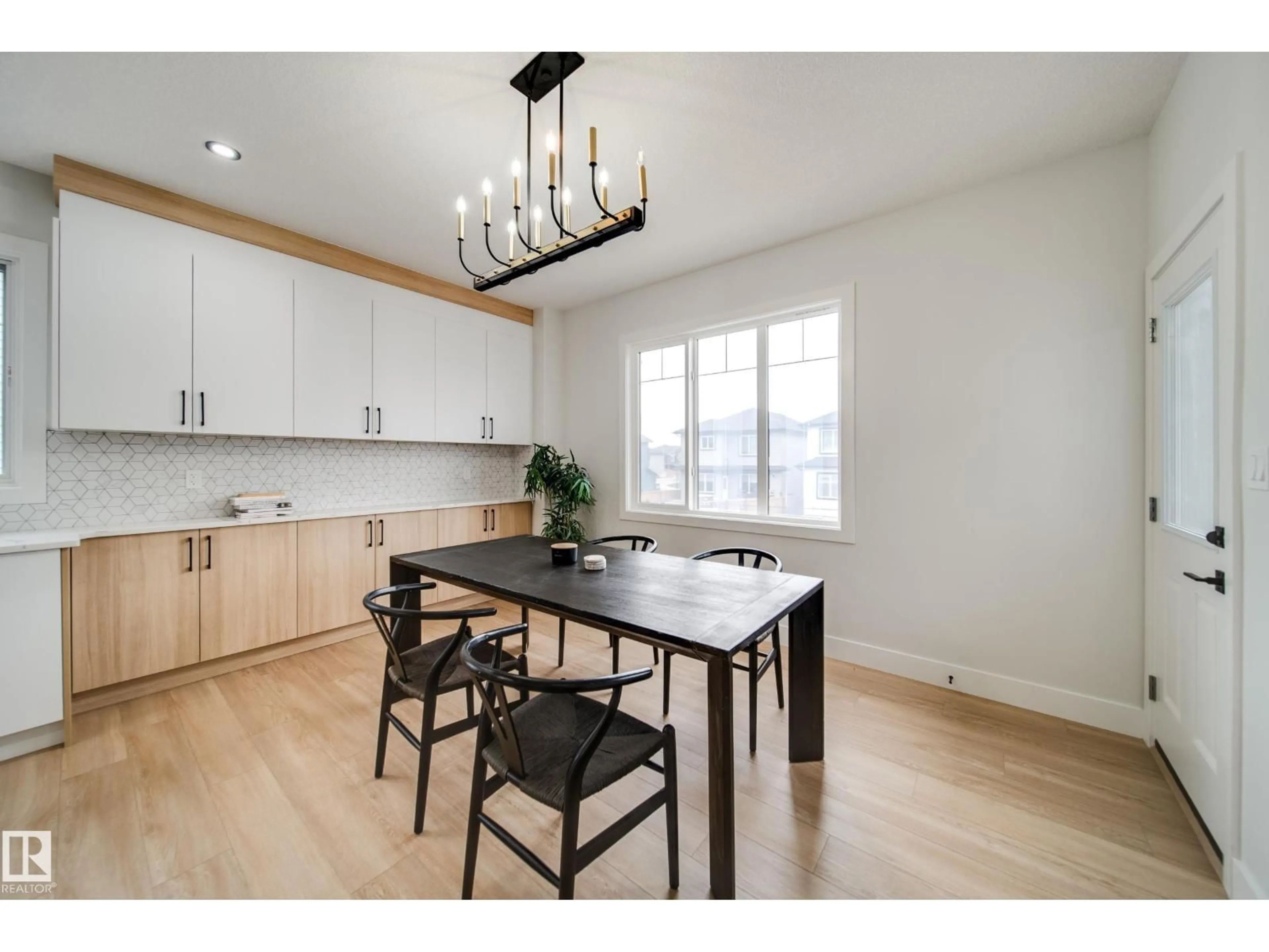 Open concept kitchen, wood/laminate floor for 5 PIERWYCK LO, Spruce Grove Alberta T7X3H1