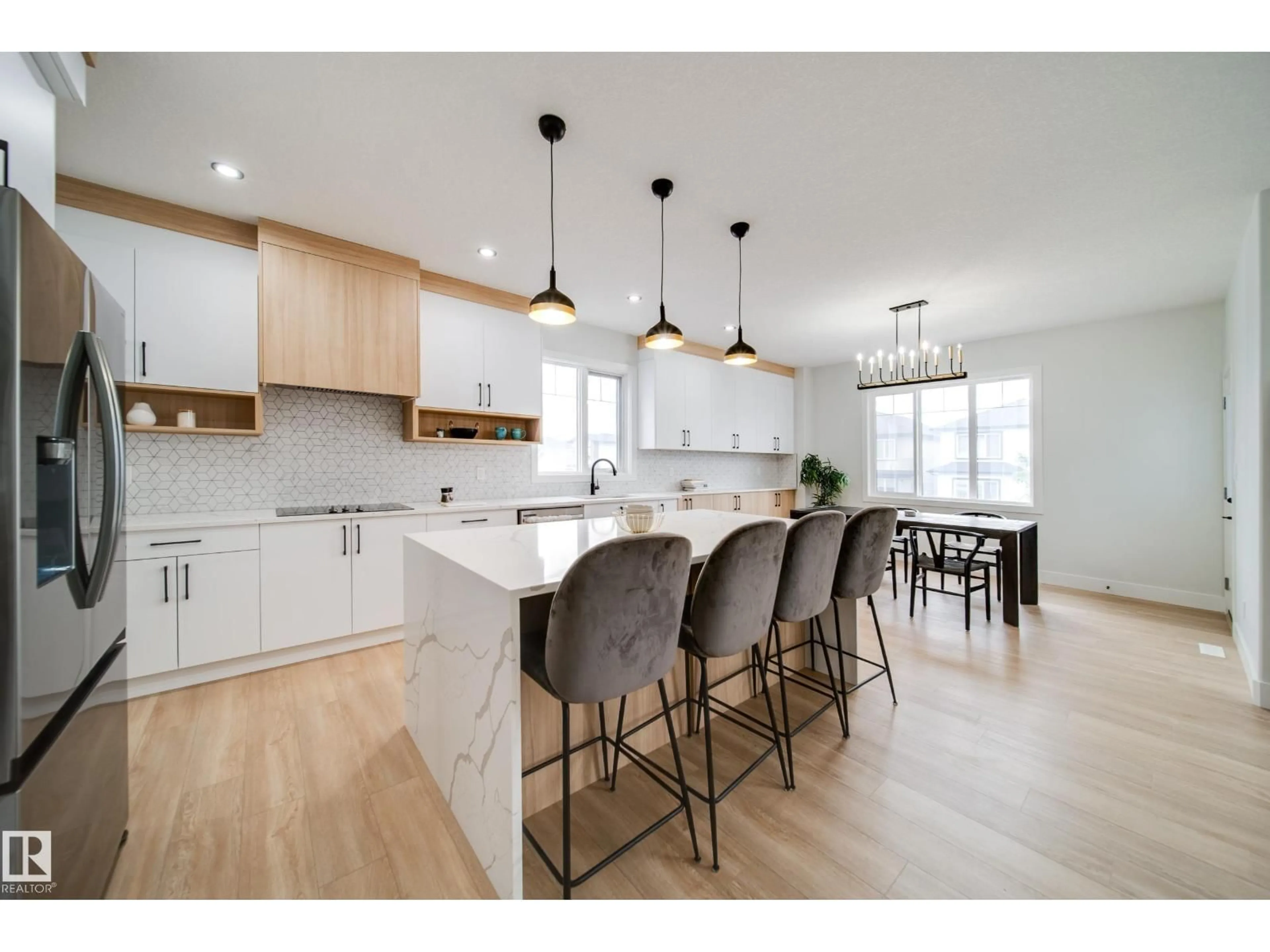 Open concept kitchen, wood/laminate floor for 5 PIERWYCK LO, Spruce Grove Alberta T7X3H1