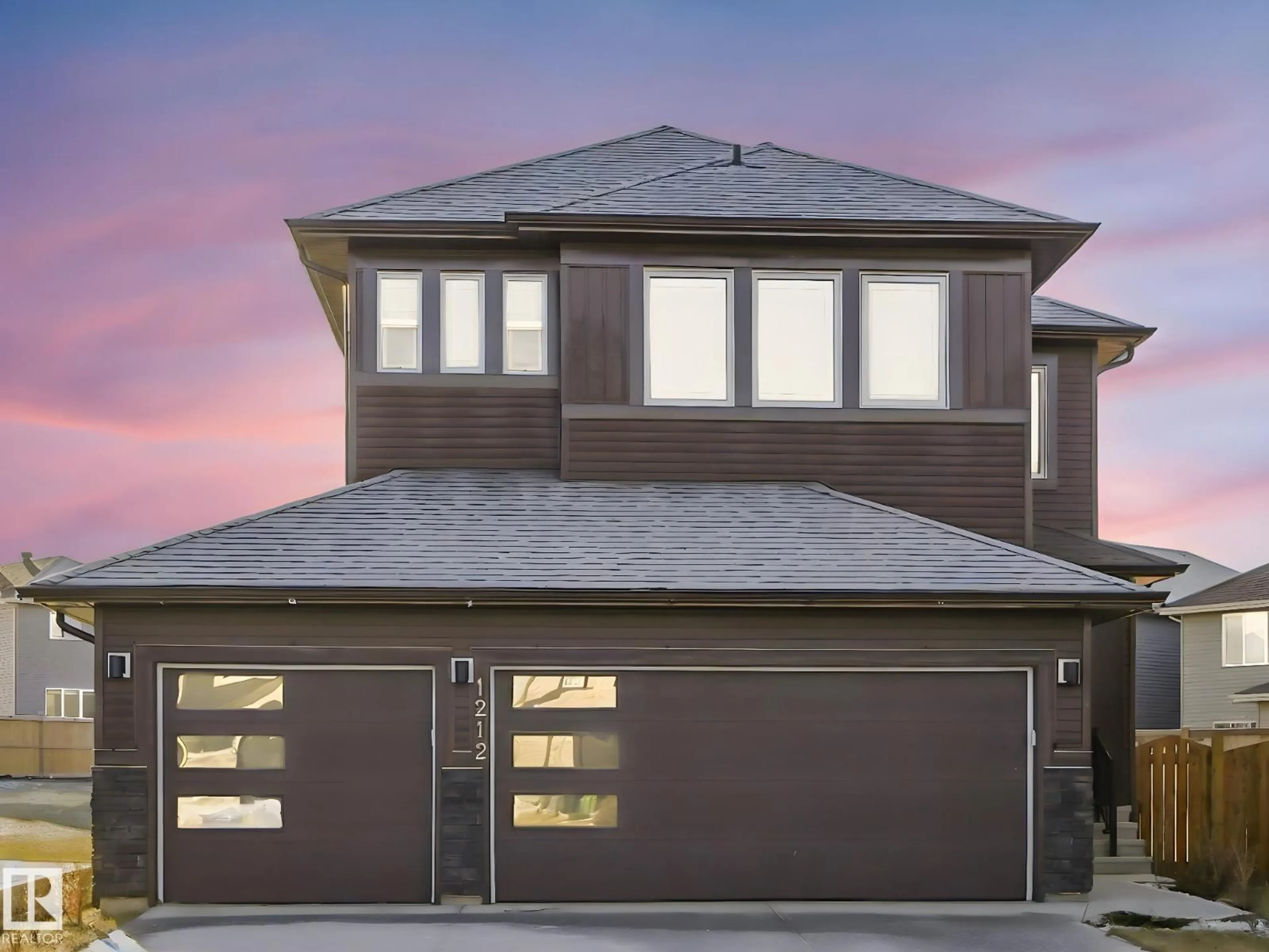 Home with vinyl exterior material, street for NW - 1212 25 ST, Edmonton Alberta T6T2J9