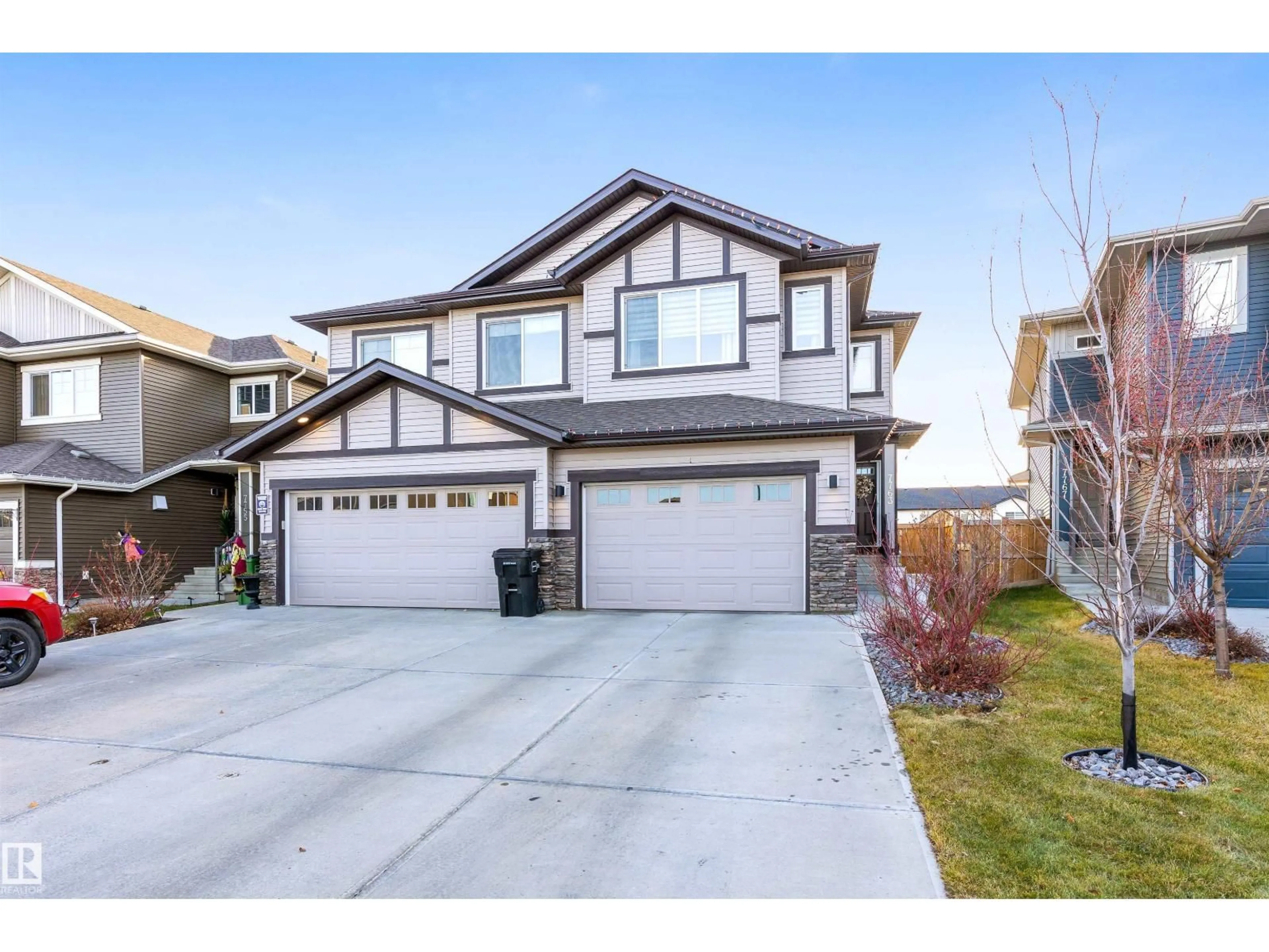 Home with vinyl exterior material, street for NW - 7763 174B AV, Edmonton Alberta T5Z0P5