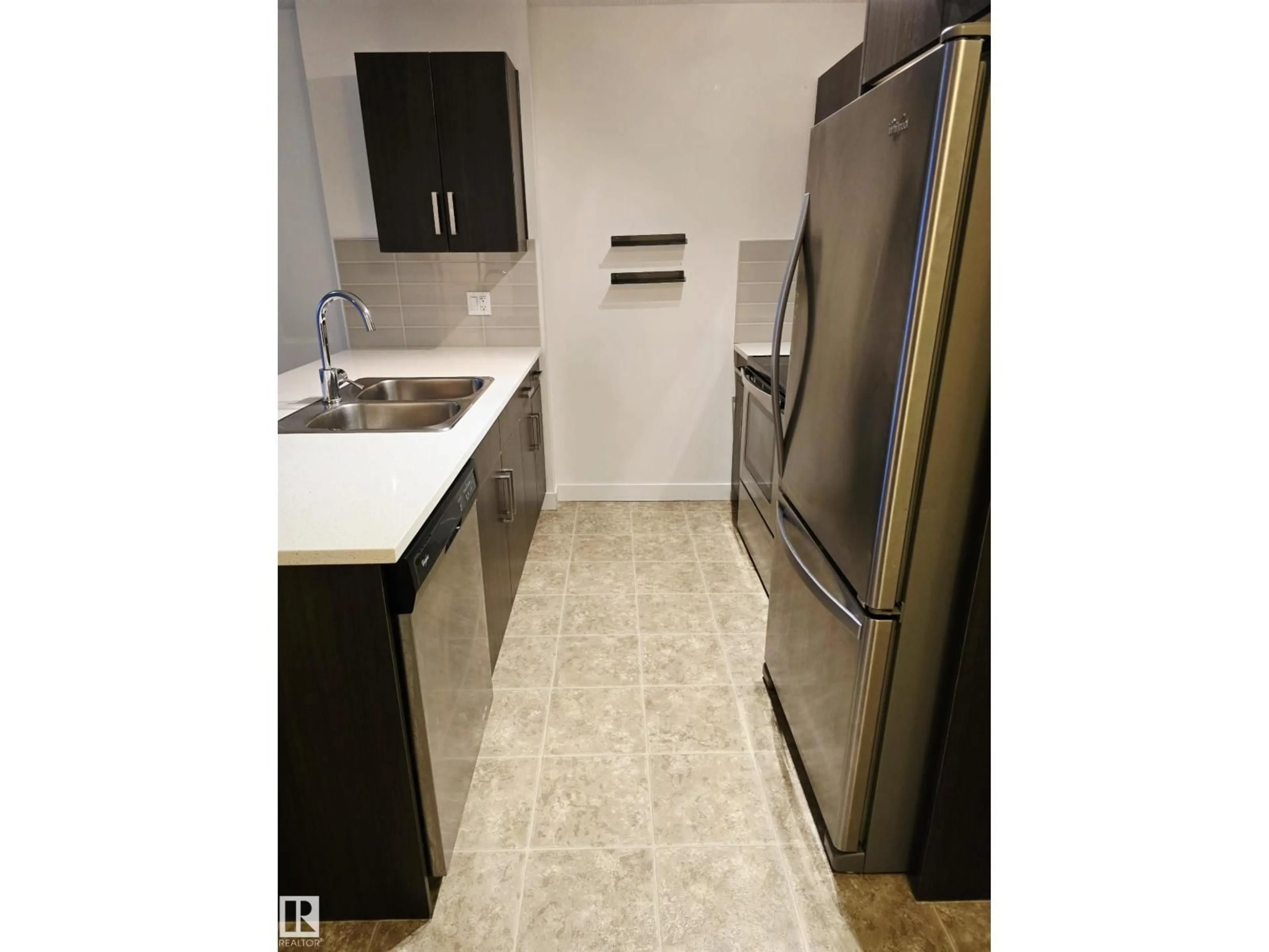 Standard kitchen, ceramic/tile floor for #101 - 667 WATT BV, Edmonton Alberta T6X0Y2