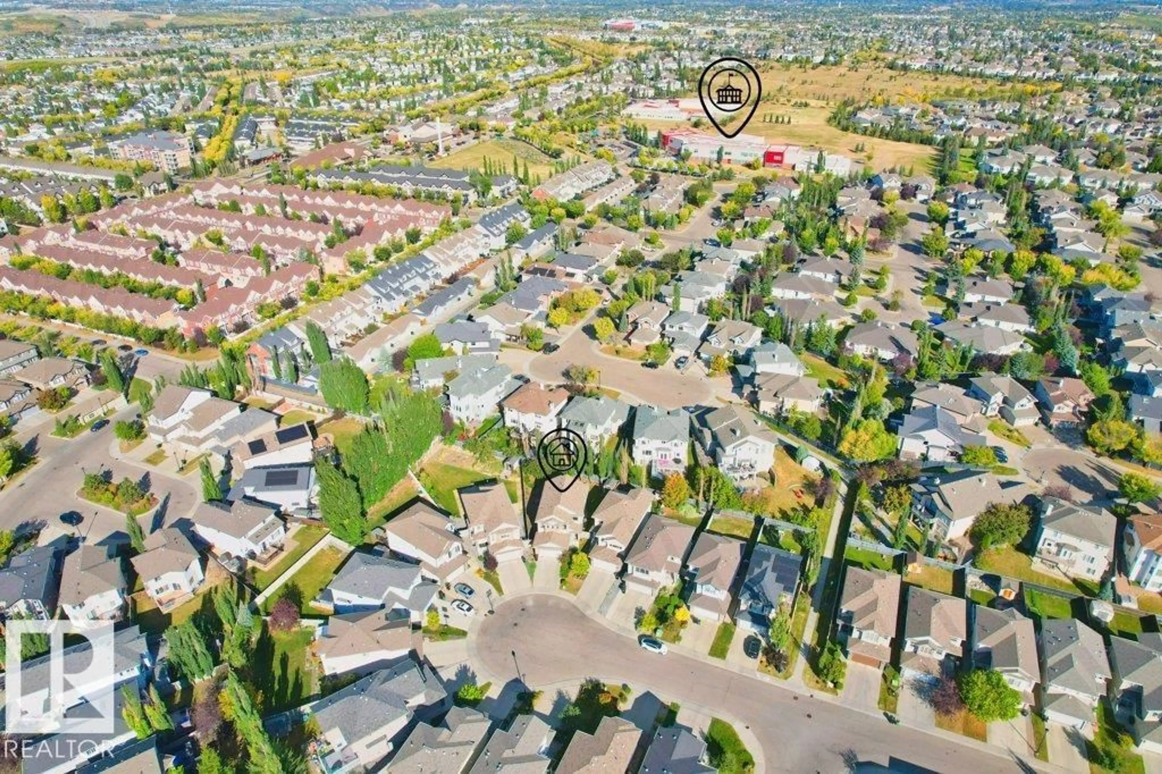 A pic from outside/outdoor area/front of a property/back of a property/a pic from drone, street for 7011 STROM LN, Edmonton Alberta T6R0T1