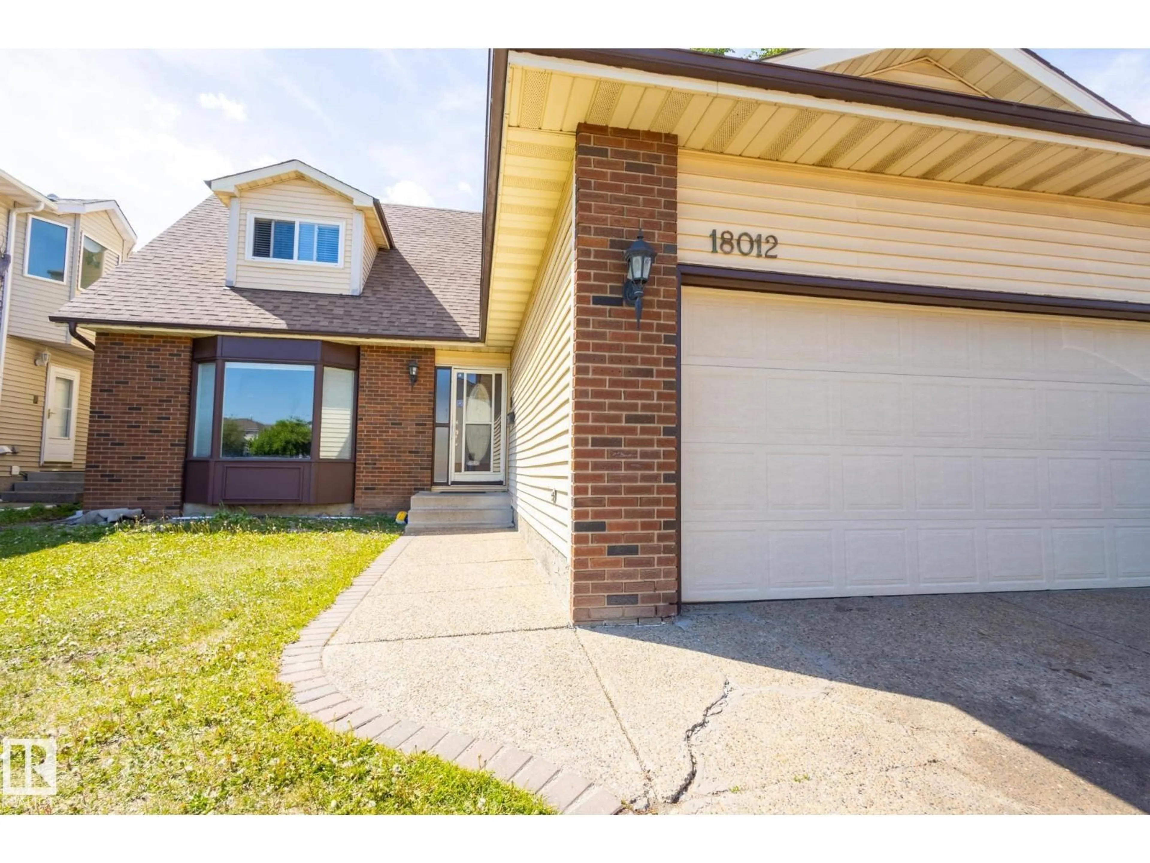 Home with brick exterior material, street for 18012 96 ST, Edmonton Alberta T5Z2G5