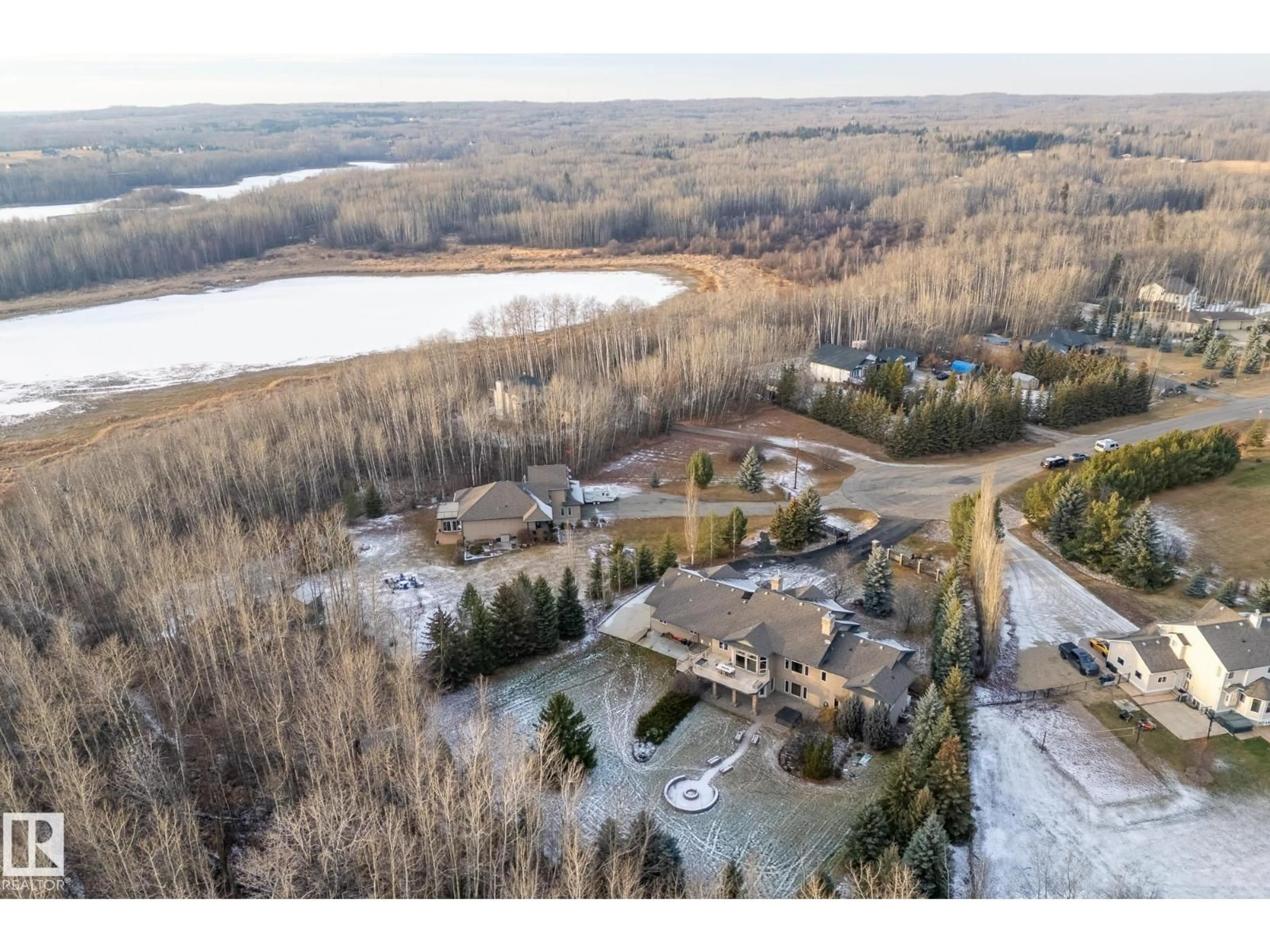 A pic from outside/outdoor area/front of a property/back of a property/a pic from drone, water/lake/river/ocean view for 53522 - 25 RGE ROAD 274, Rural Parkland County Alberta T7X3T1
