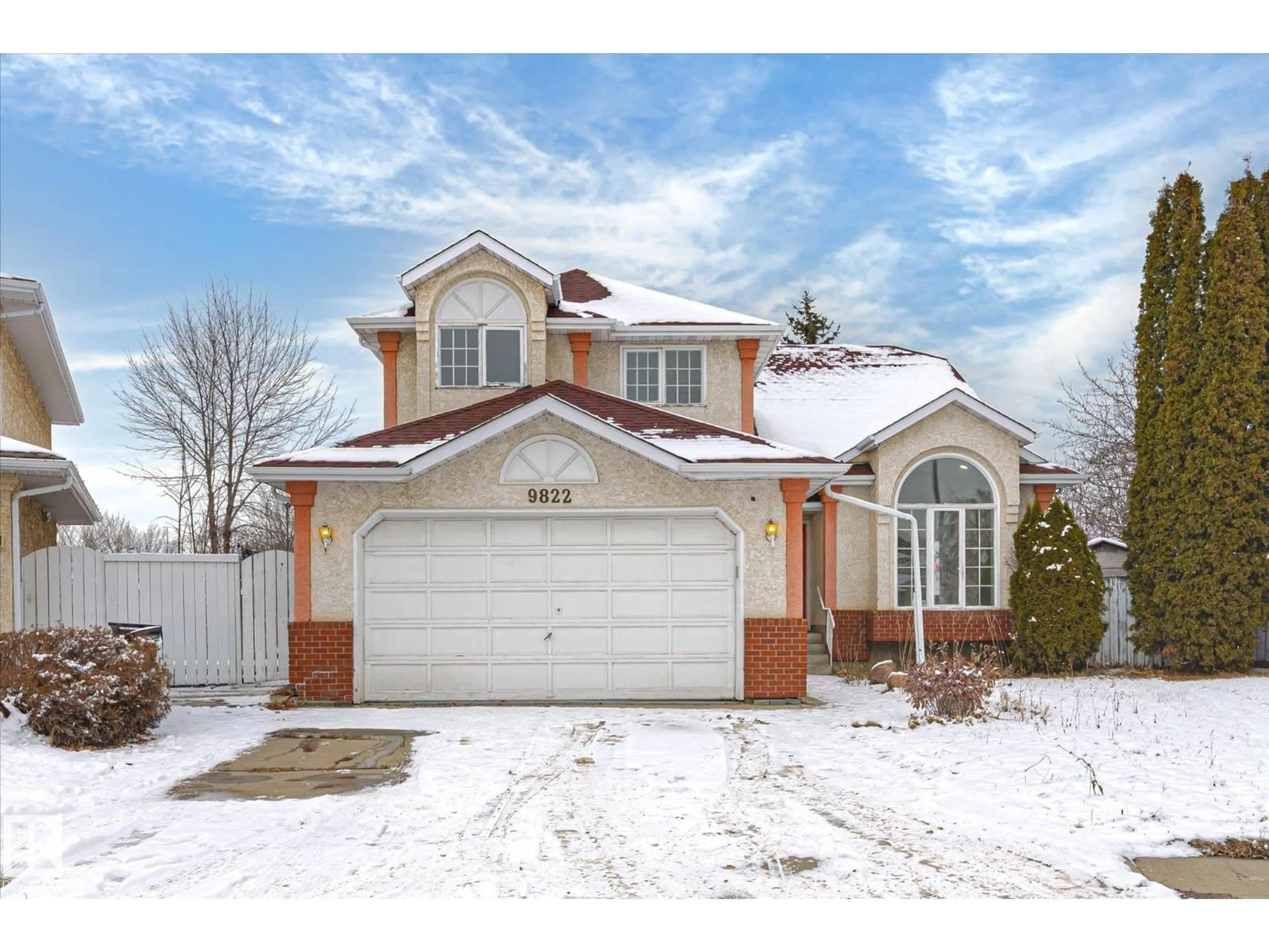 Home with brick exterior material, street for NW - 9822 175 AV, Edmonton Alberta T5X5V4