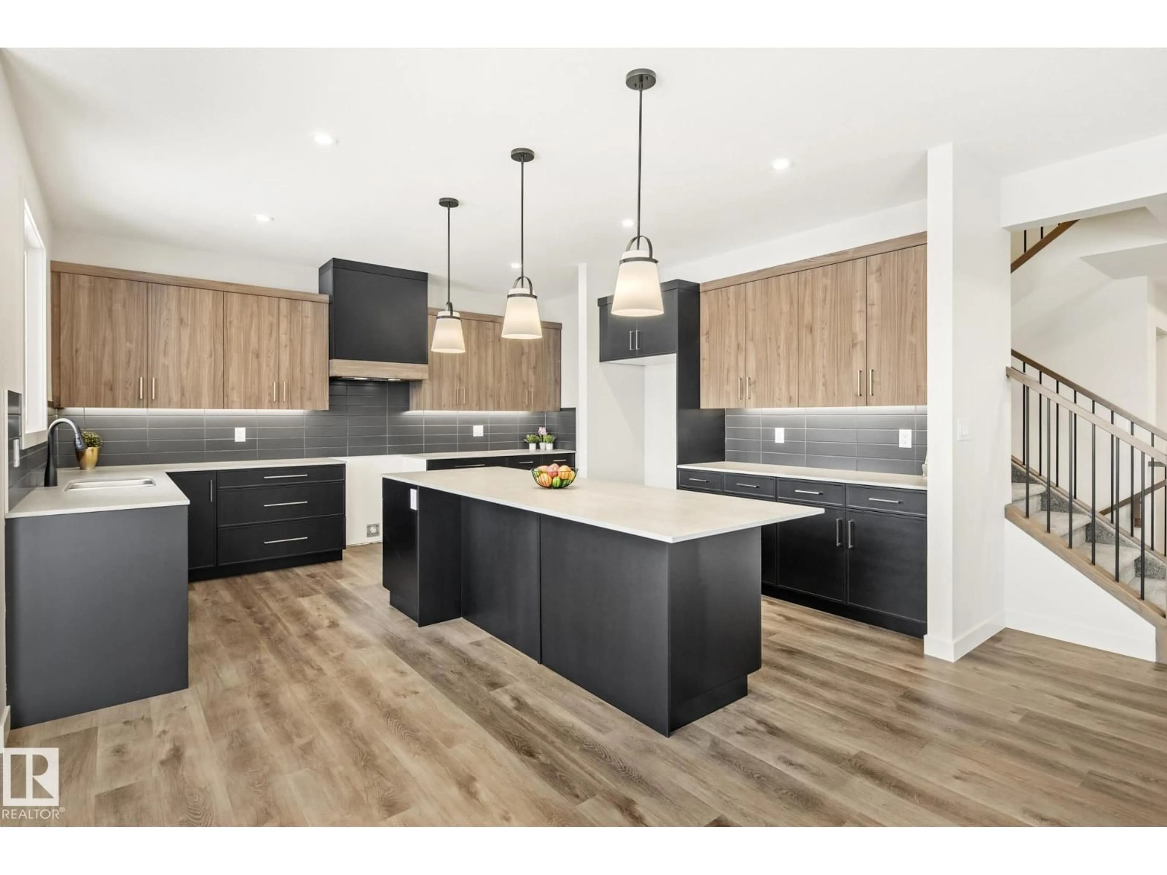 Open concept kitchen, wood/laminate floor for 10 PRESCOTT BV, Spruce Grove Alberta T7X0R5