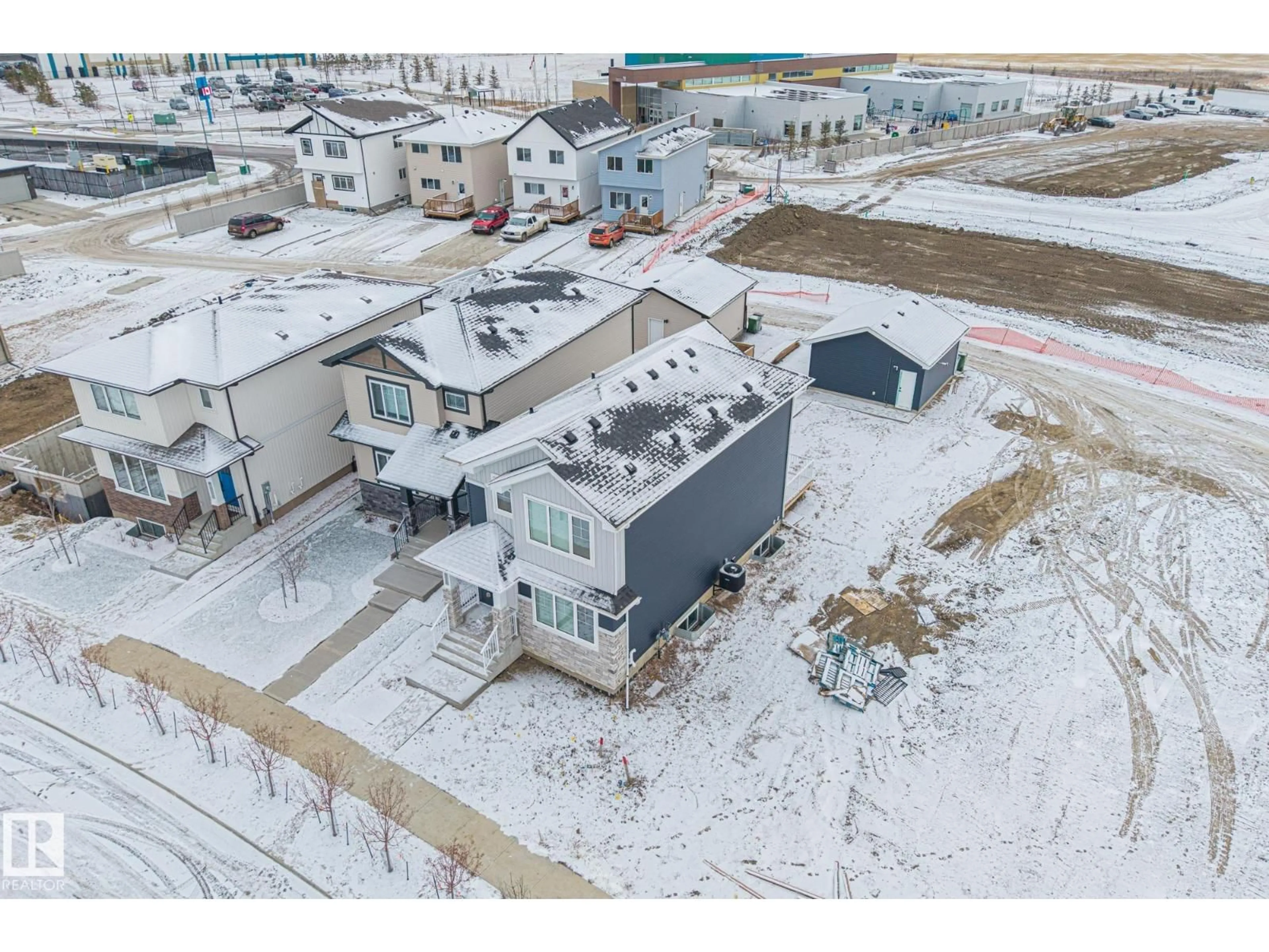 A pic from outside/outdoor area/front of a property/back of a property/a pic from drone, building for 10225 92A AV, Morinville Alberta T8R2R4