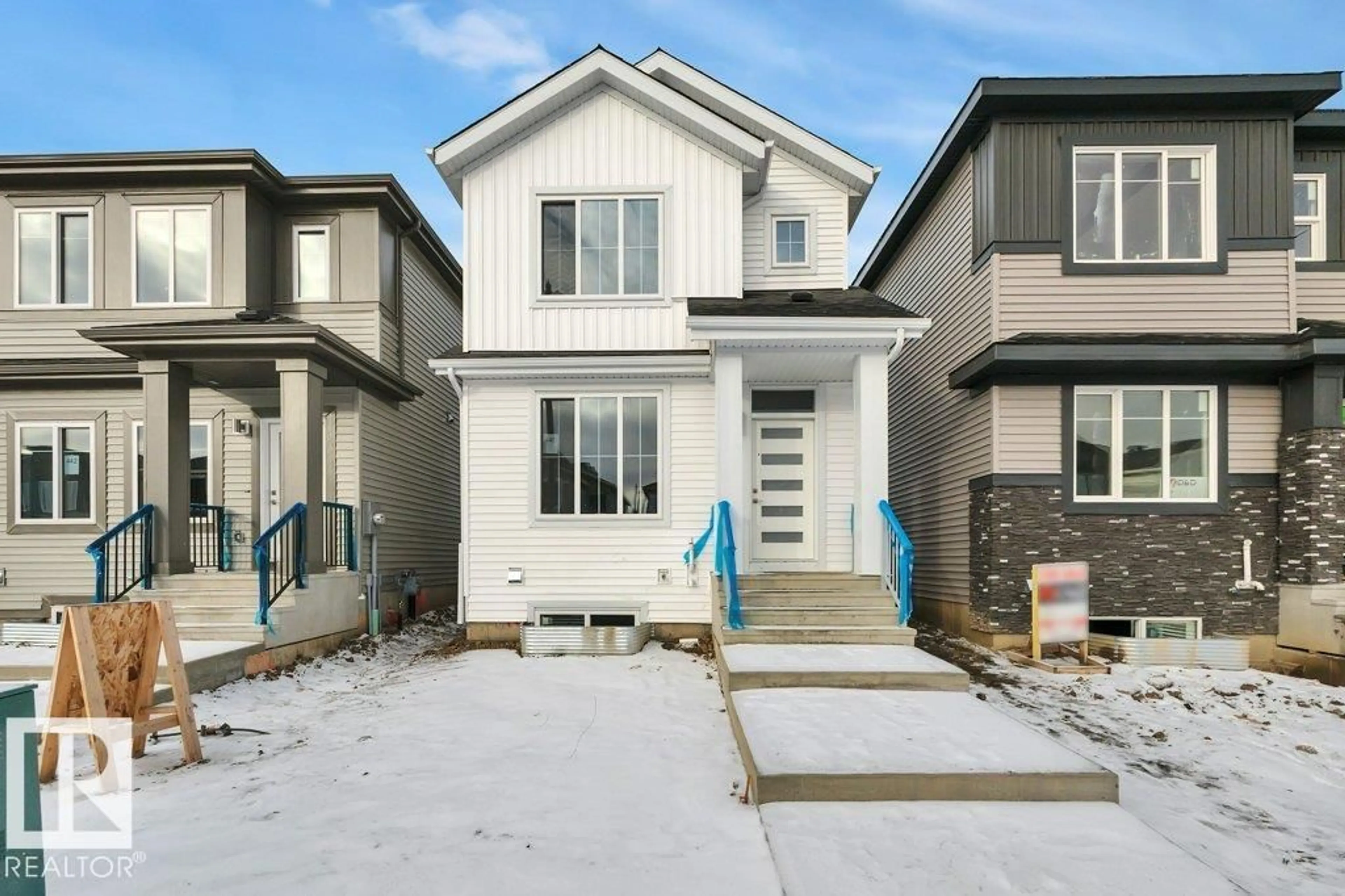 Home with vinyl exterior material, street for 440 CRYSTAL CREEK LINK, Leduc Alberta T9E0K5