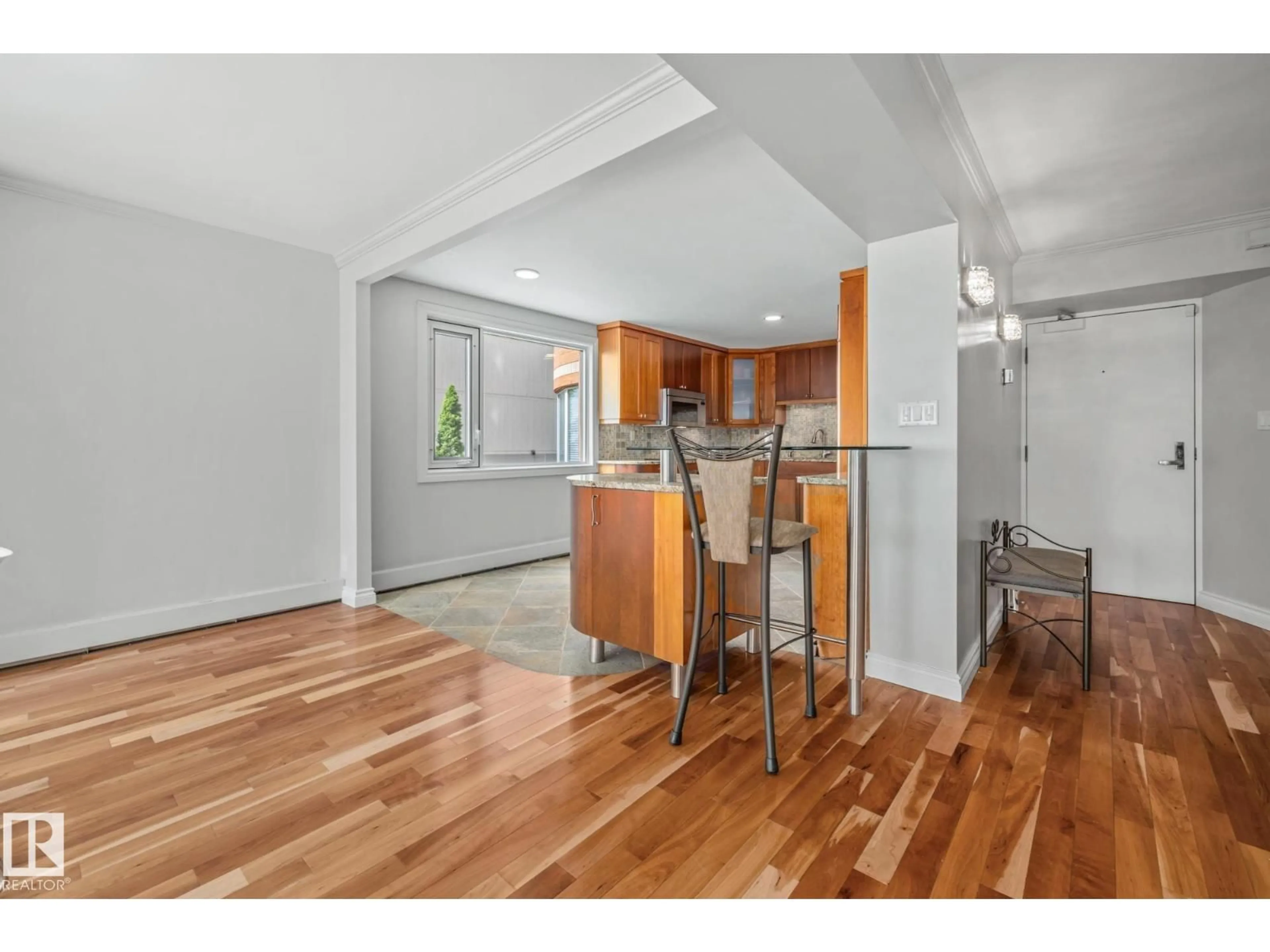 Open concept kitchen, wood/laminate floor for 202 - 10010 119 ST, Edmonton Alberta T5K1Y8