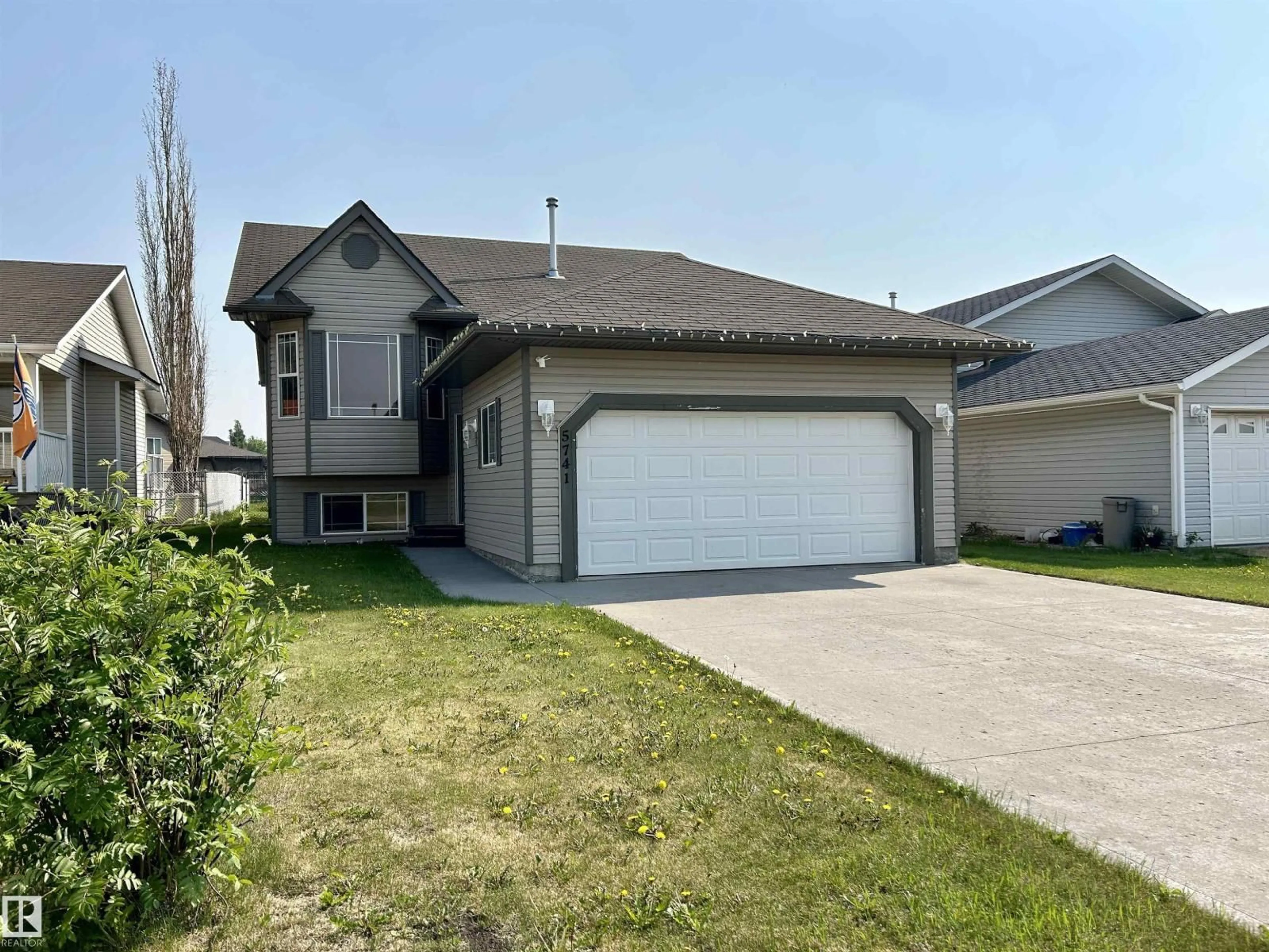 Home with vinyl exterior material, street for 5741 48 AV, St. Paul Town Alberta T0A3A1
