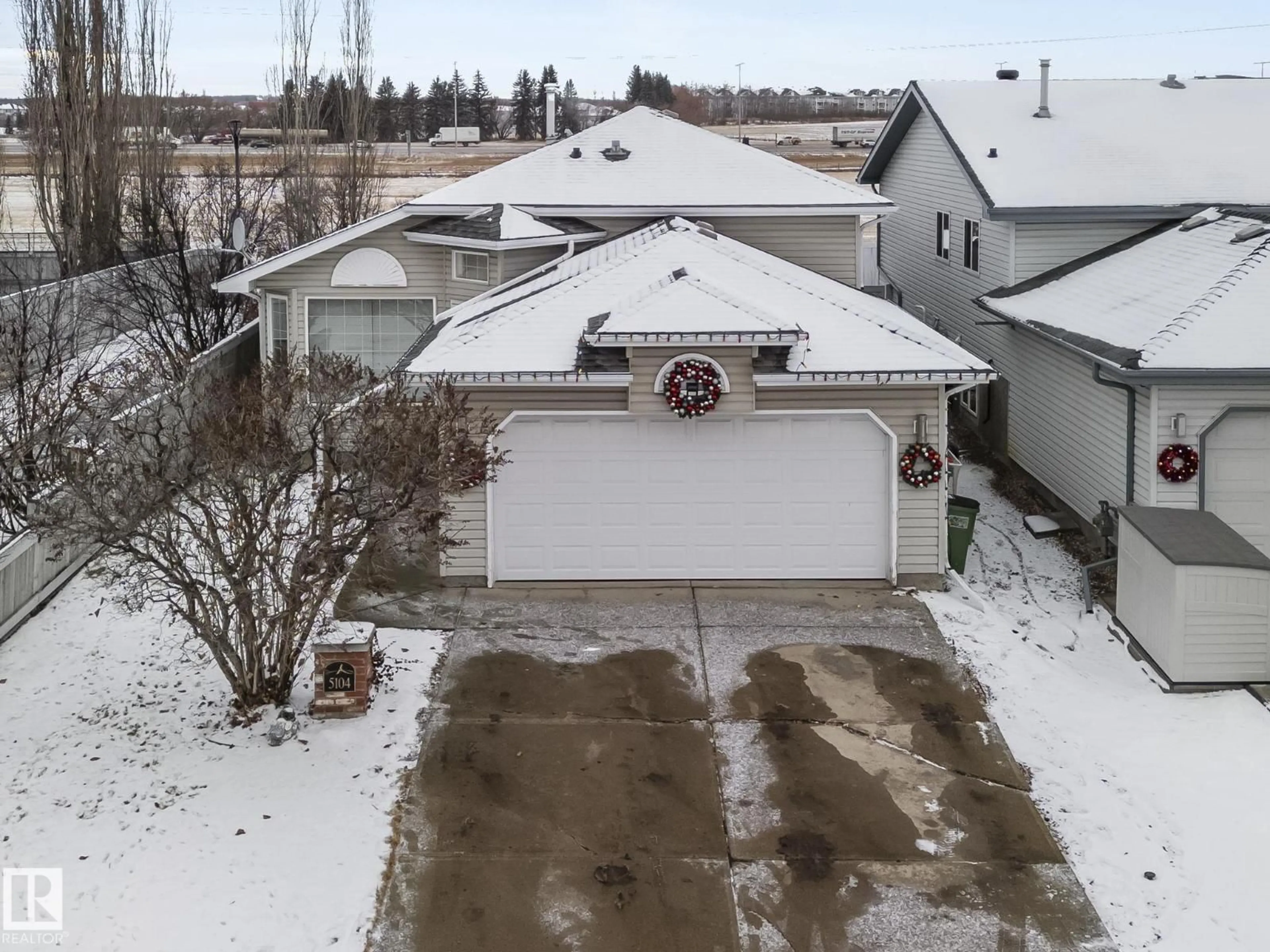 A pic from outside/outdoor area/front of a property/back of a property/a pic from drone, street for NW - 5104 191 ST, Edmonton Alberta T6M2R6