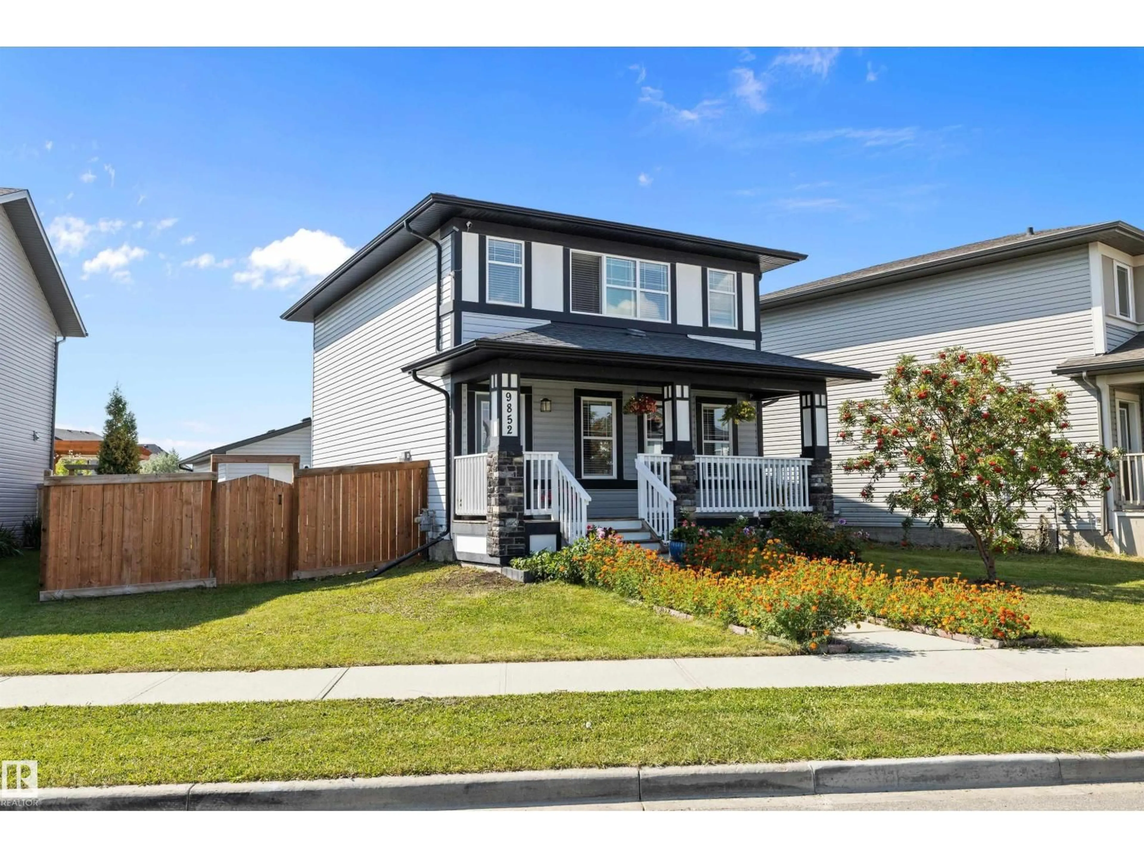 Home with vinyl exterior material, street for NW - 9852 217 ST, Edmonton Alberta T5T4T7