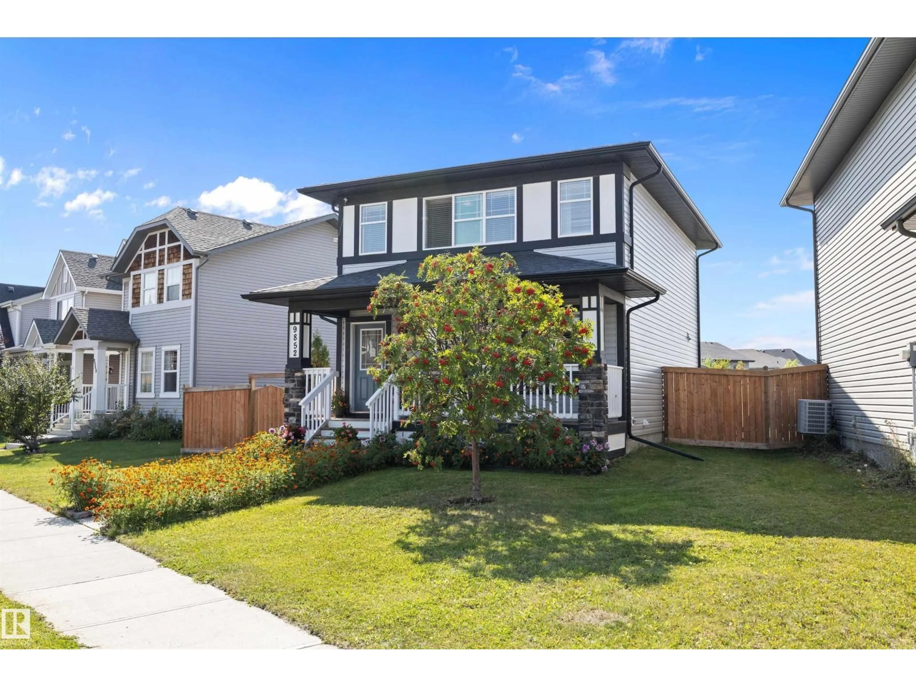 Home with vinyl exterior material, street for NW - 9852 217 ST, Edmonton Alberta T5T4T7