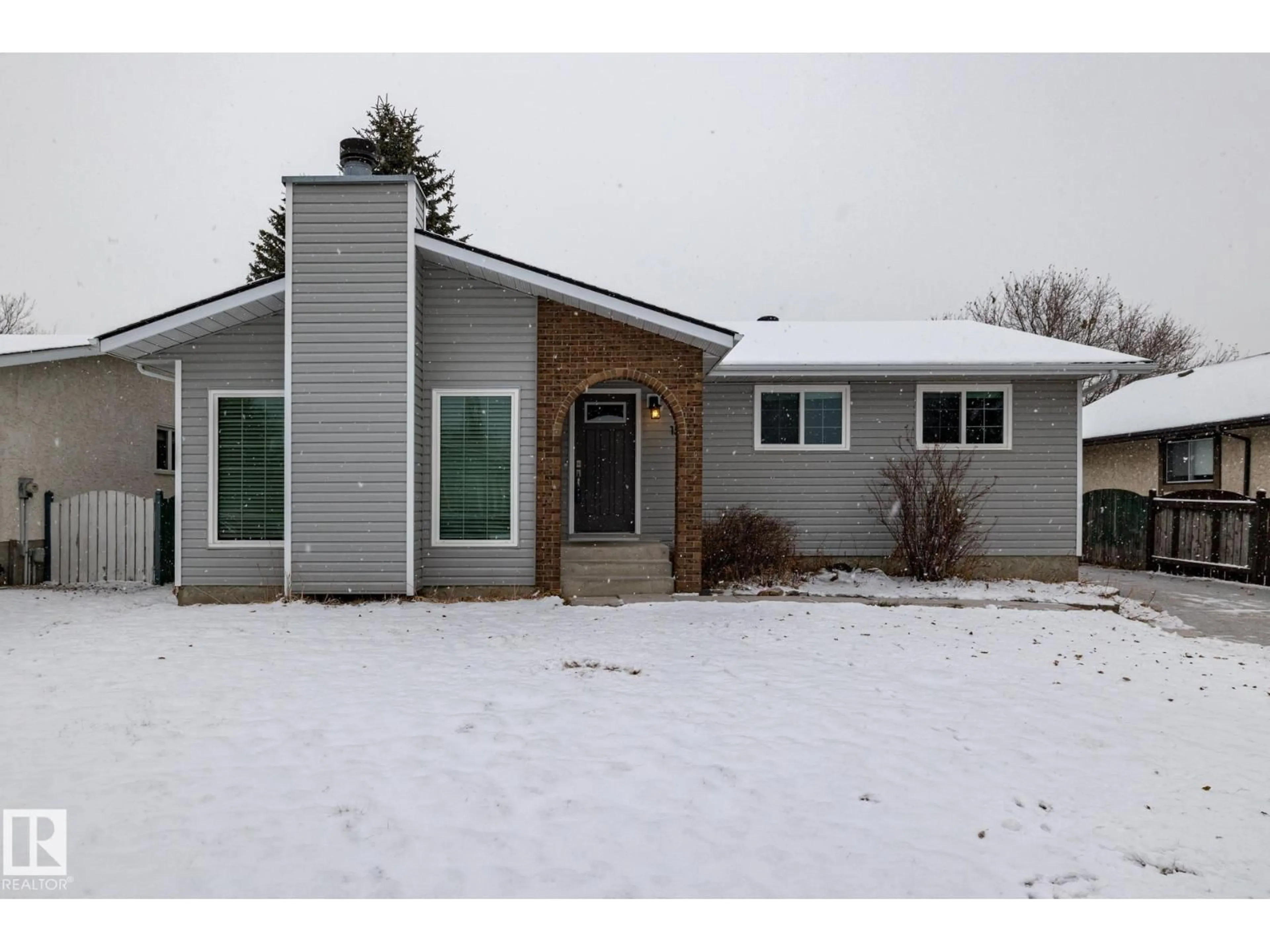 Home with vinyl exterior material, street for NW - 15003 58 ST, Edmonton Alberta T5A4H4