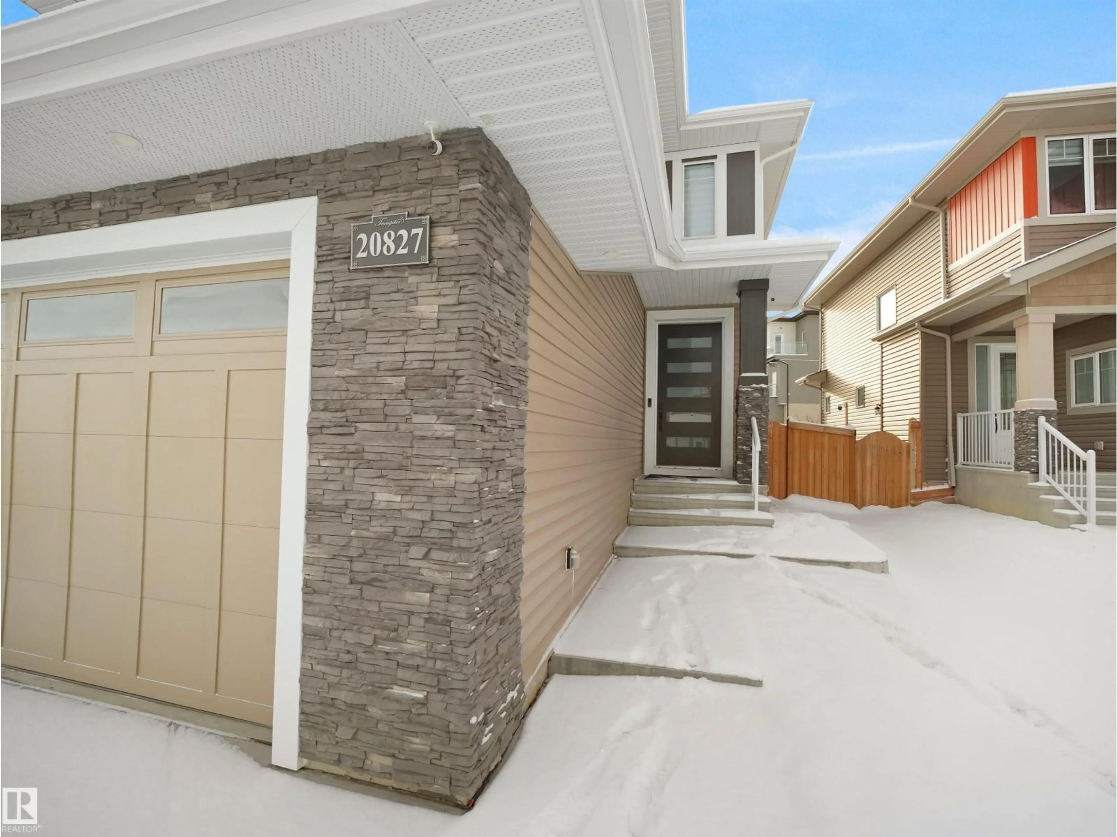 Home with brick exterior material, street for NW - 20827 130 AV, Edmonton Alberta T5S0L4