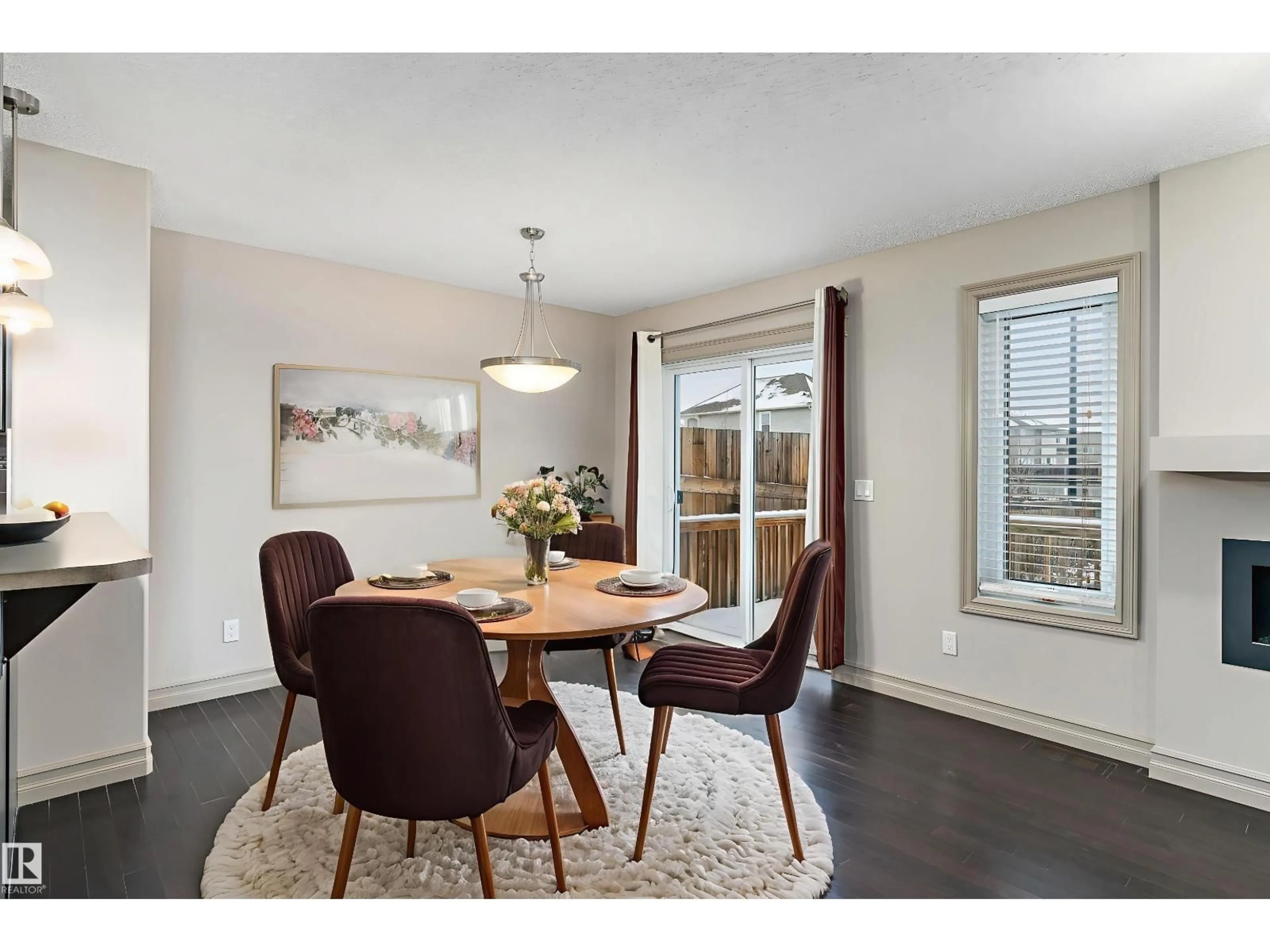 Dining room, wood/laminate floor for 605 175A ST, Edmonton Alberta T6W2G5