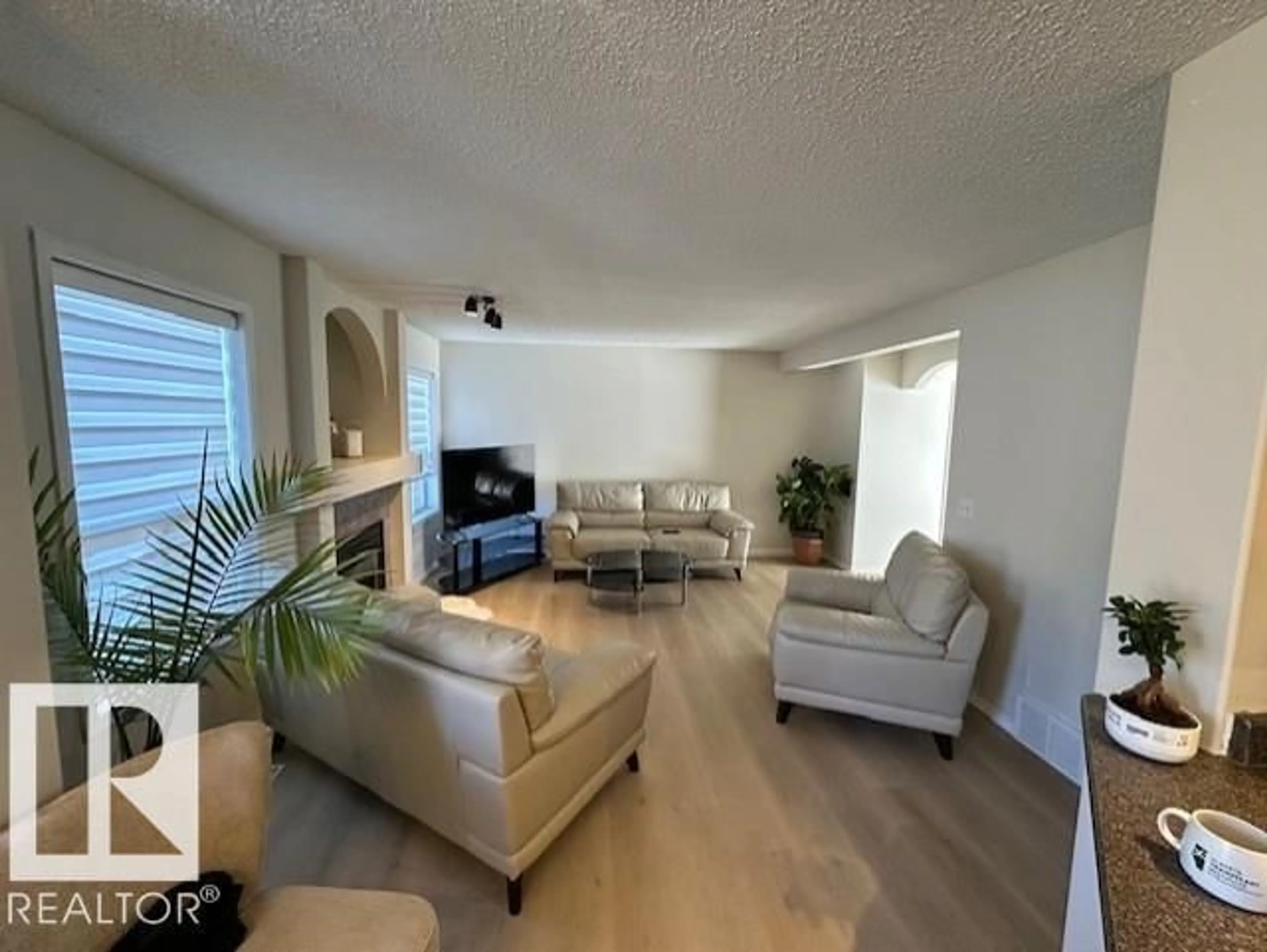 Living room with furniture, unknown for 9806 179 AV, Edmonton Alberta T5X6A6