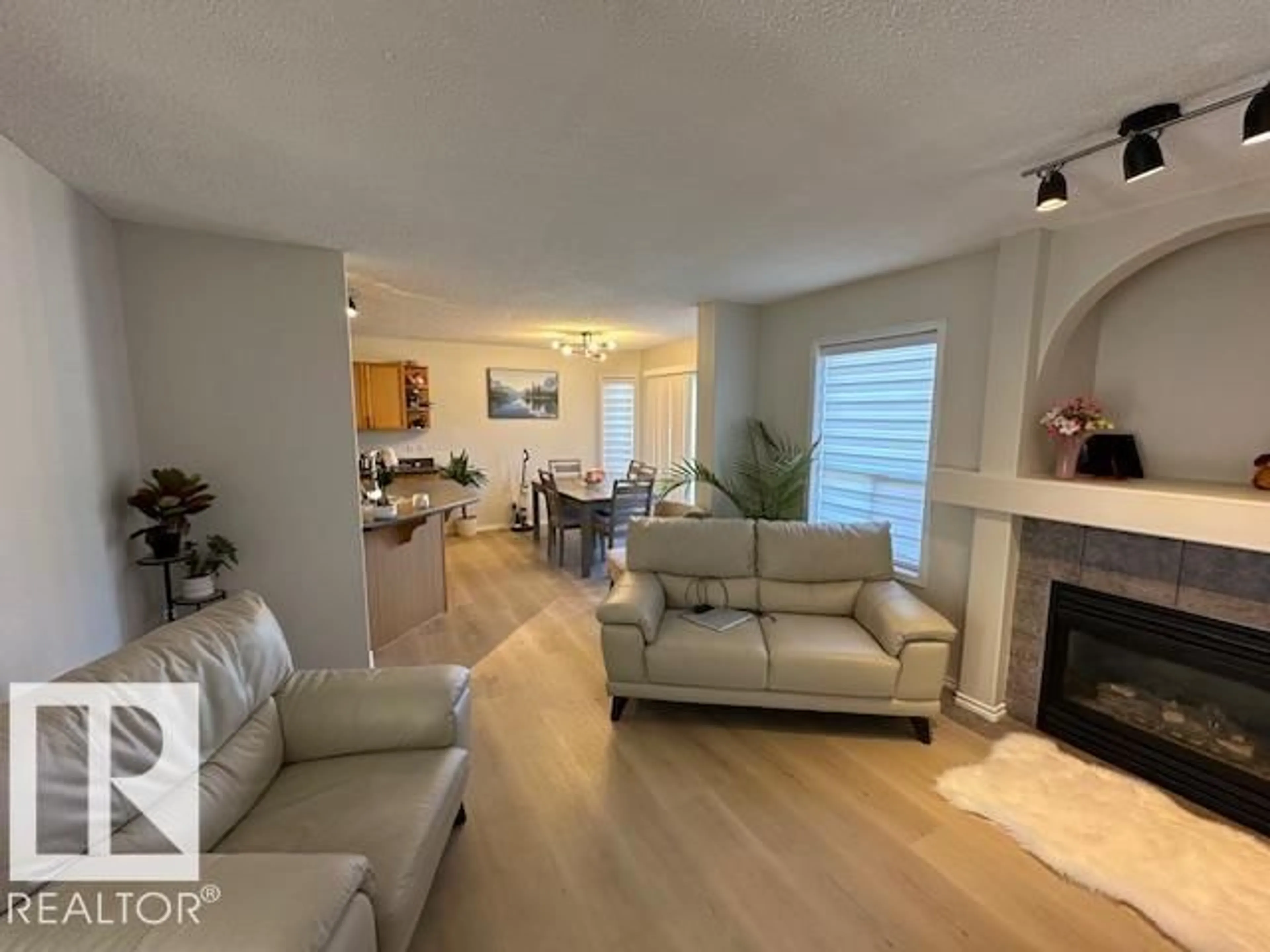 Living room with furniture, unknown for 9806 179 AV, Edmonton Alberta T5X6A6