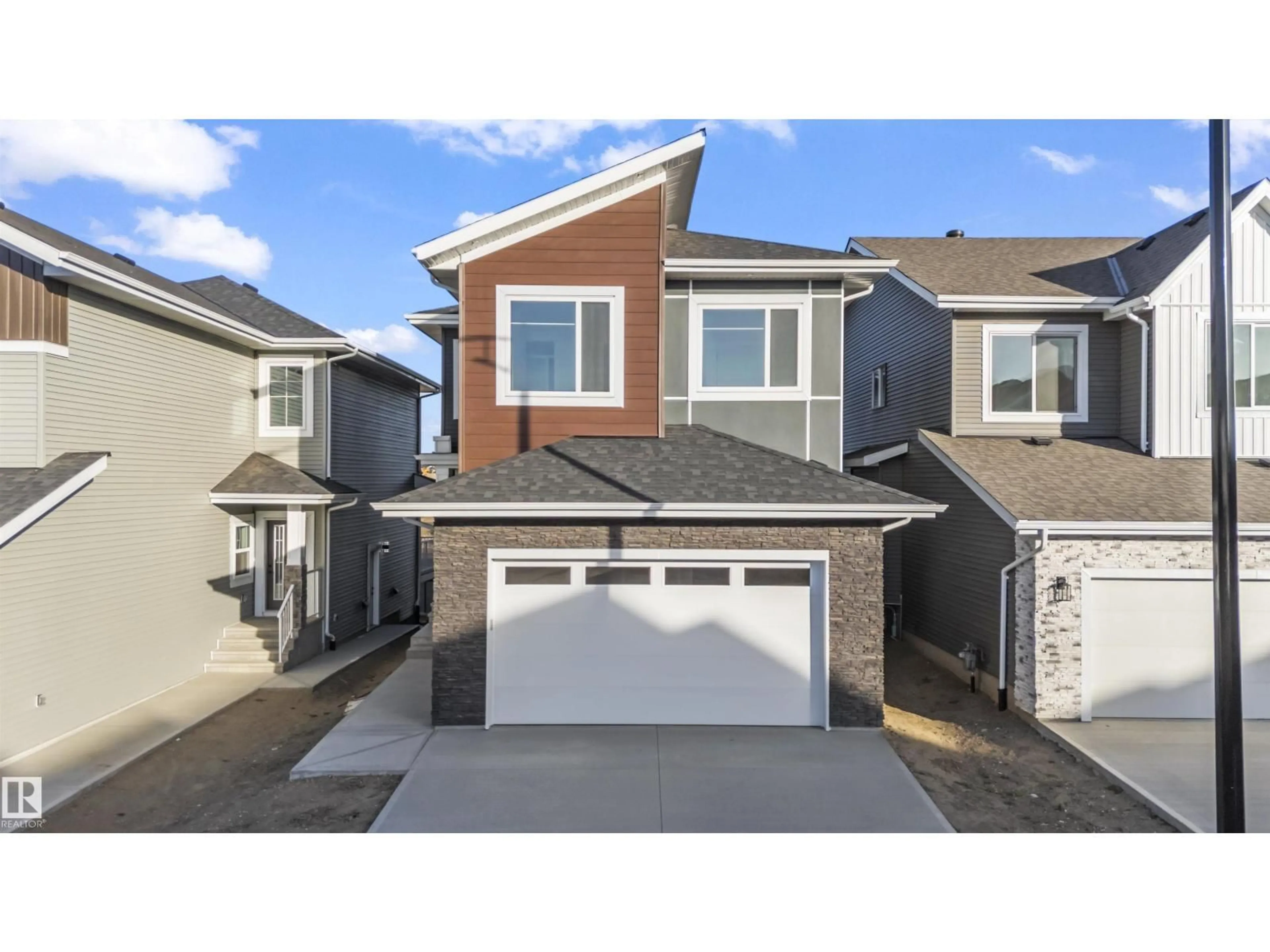 Home with vinyl exterior material, street for 3333 CHICKADEE DR, Edmonton Alberta T5S0V6