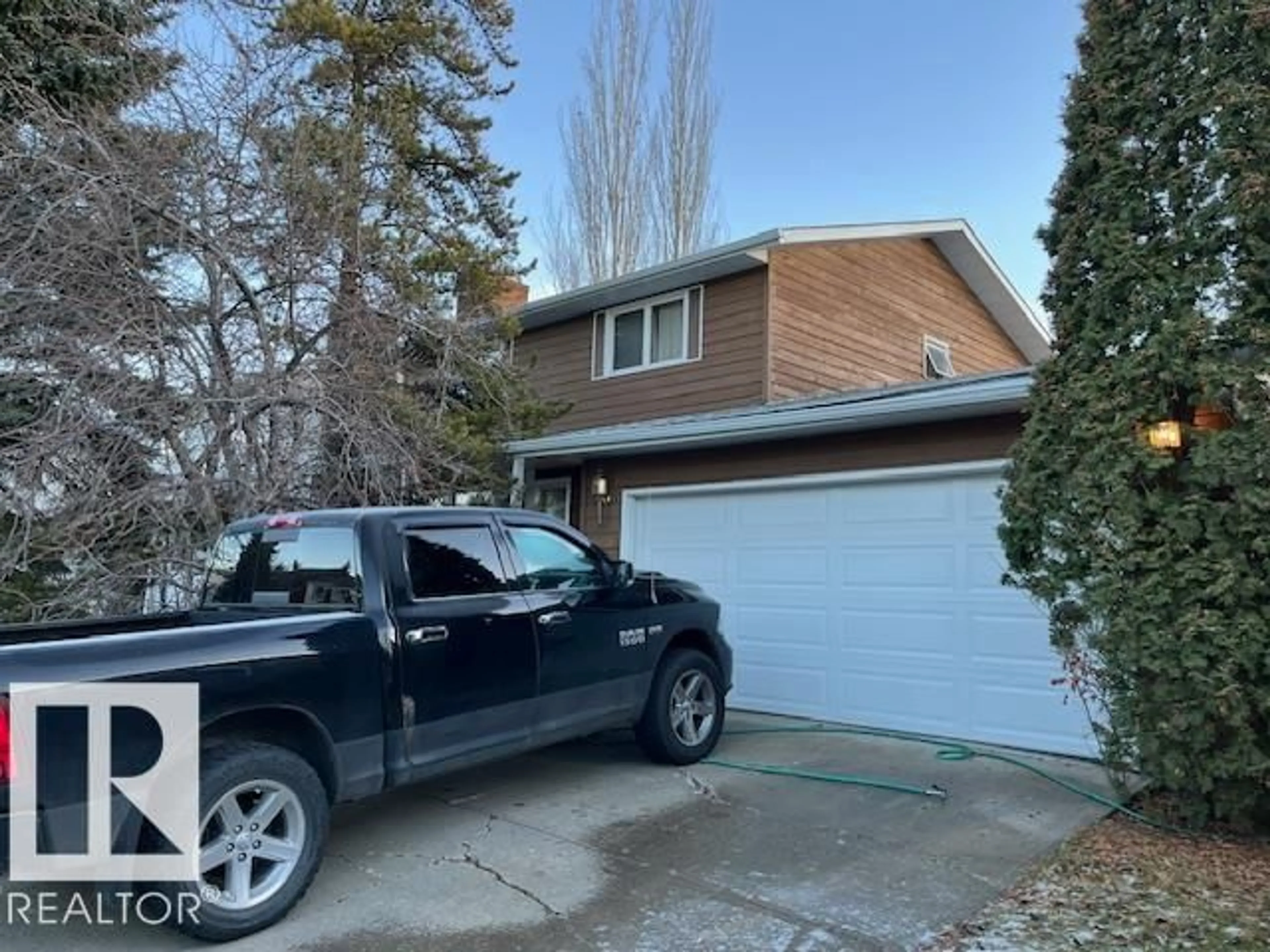 A pic from outside/outdoor area/front of a property/back of a property/a pic from drone, street for 10427 28 AV, Edmonton Alberta T6J4A2