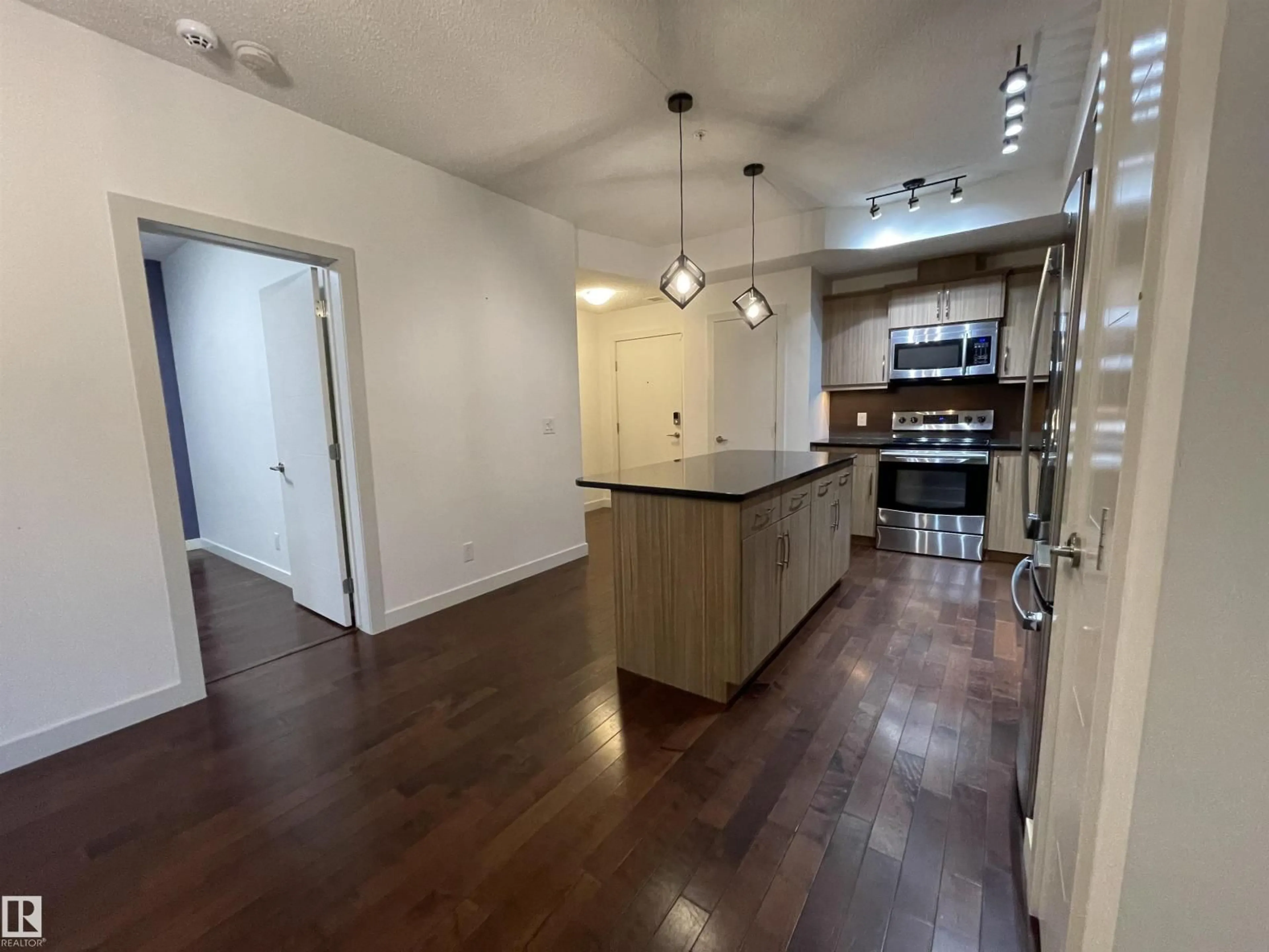 A pic of a room for #115 - 10523 123 ST, Edmonton Alberta T5N1N9