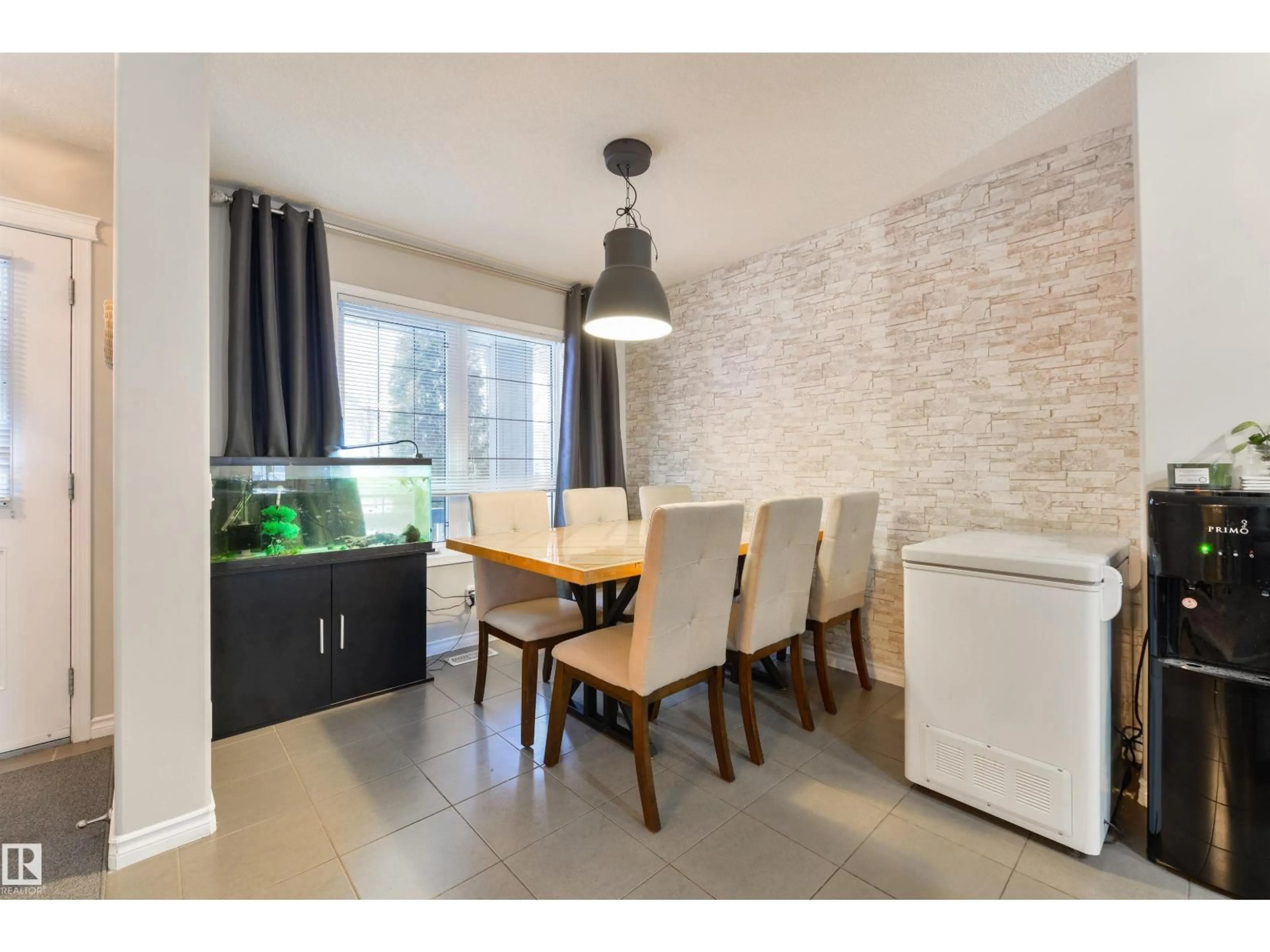 Dining room, wood/laminate floor for 346 SECORD BV, Edmonton Alberta T5T5X9